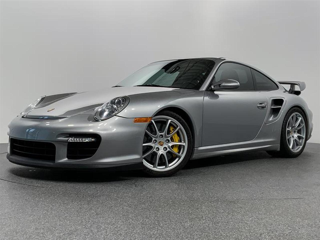 This GT2 is an extraordinary sports car that combines extreme performance, luxury, and track-oriented precision. With its twin-turbocharged engine, aggressive styling, Porsche&rsquo;s legendary handling capabilities, and driver-focused interior, it offers an unforgettable driving experience.  This vehicle has been Meticulously Kept with No Reported Accidents or Claims!  This 2008 Porsche 911 Carrera GT2 comes in GT Silver Metallic with A FULL Black Leather Interior.   The Porsche 911 GT2 has the low-slung spoiler lip at the front and the rear wing so the characteristic of this very special model gives the Porsche 911 GT2 remarkable down force both front and rear, while simultaneously maintaining the silhouette so characteristic of this top model.  We Accept All Trade-Ins and Buy-Ins!!  Porsche Center Langley has been honored with the prestigious Porsche Premier Dealer Award for eight consecutive years. Conveniently located near Highway 1 in beautiful Langley, British Columbia. Open Road provides appealing finance and lease options tailored to meet your specific needs. Contact one of our highly trained Sales Executives for further assistance.  Please note that additional fees, including a $599 documentation fee & a $690 dealer prep fee, apply to all preowned vehicles.  Dealer #40136