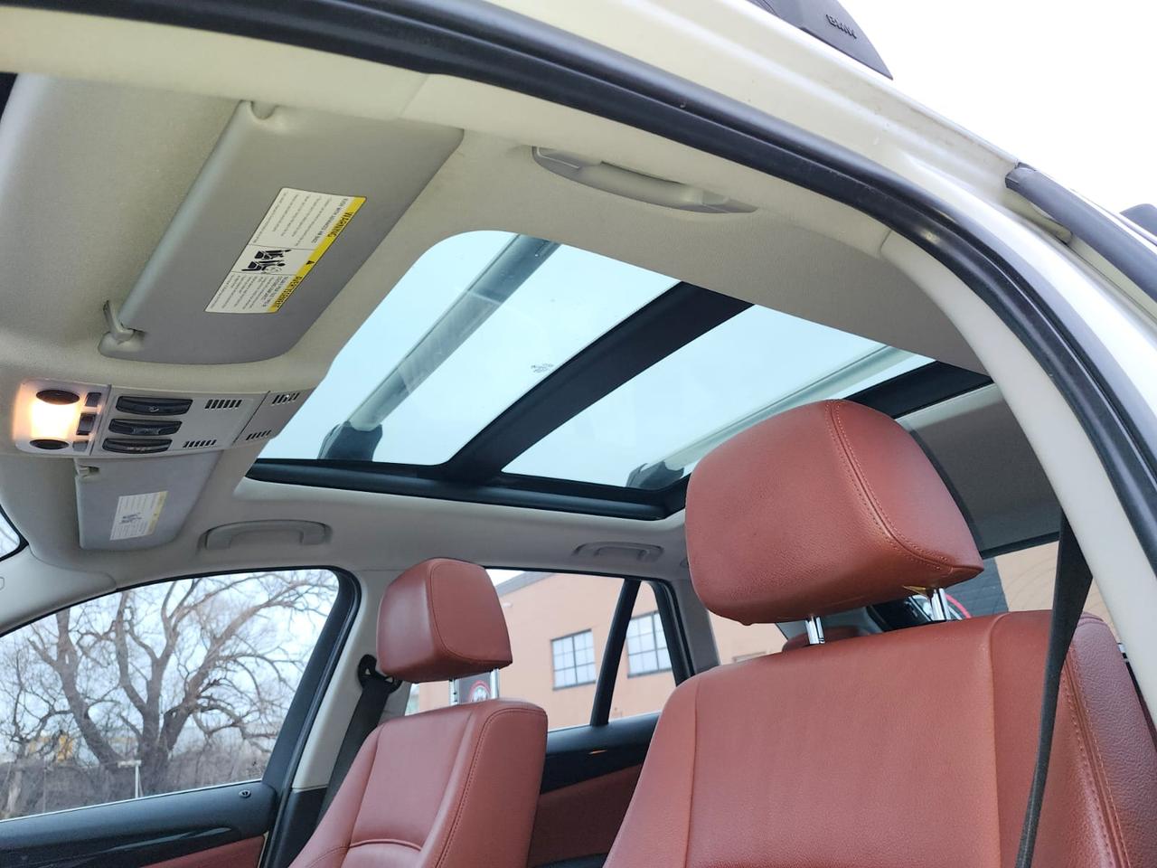 2012 BMW X1 Navigation, Pano Roof, AWD 4dr 28i Photo