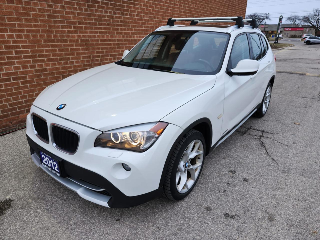 2012 BMW X1 Navigation, Pano Roof, AWD 4dr 28i Photo