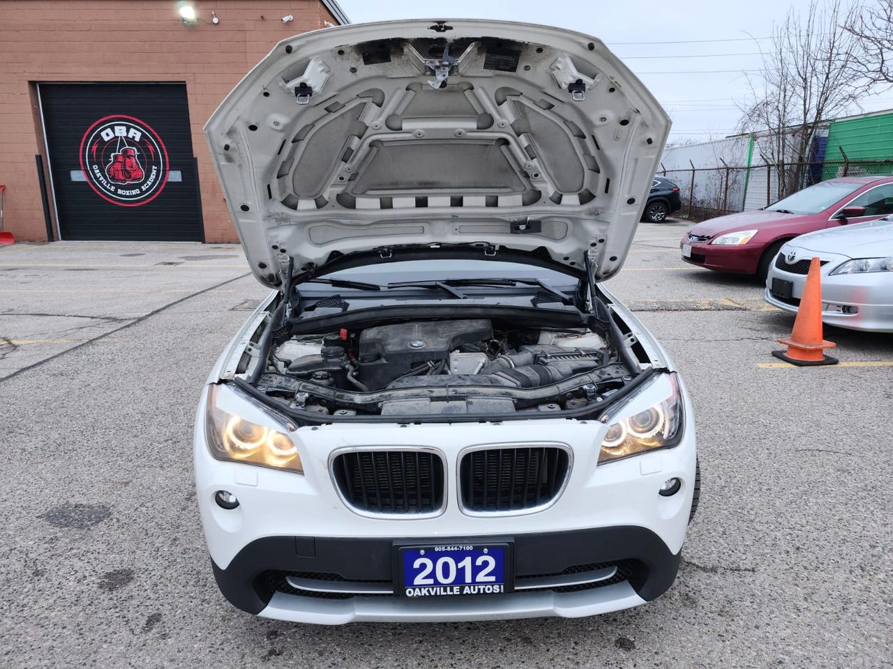 2012 BMW X1 Navigation, Pano Roof, AWD 4dr 28i Photo