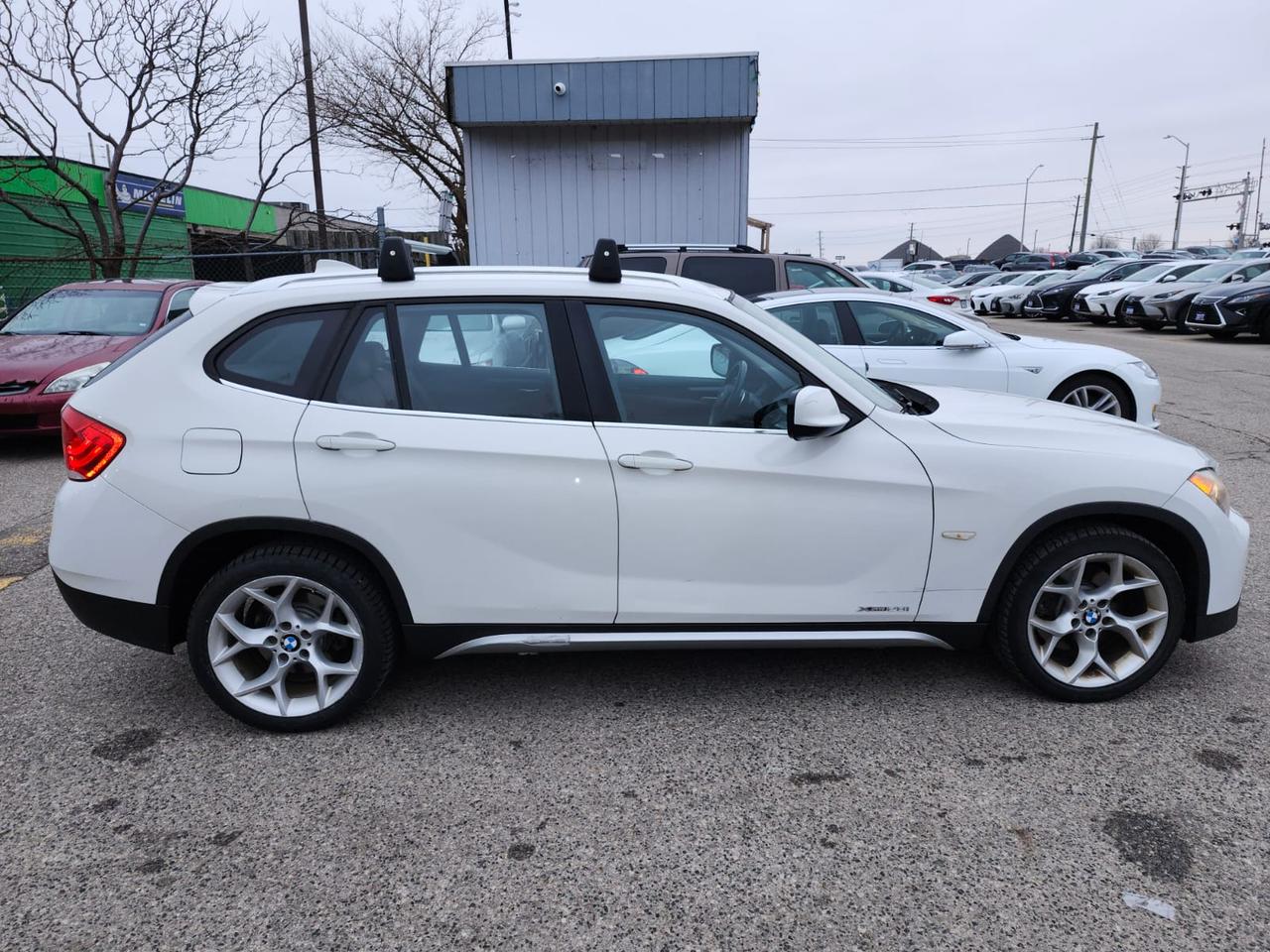 2012 BMW X1 Navigation, Pano Roof, AWD 4dr 28i Photo