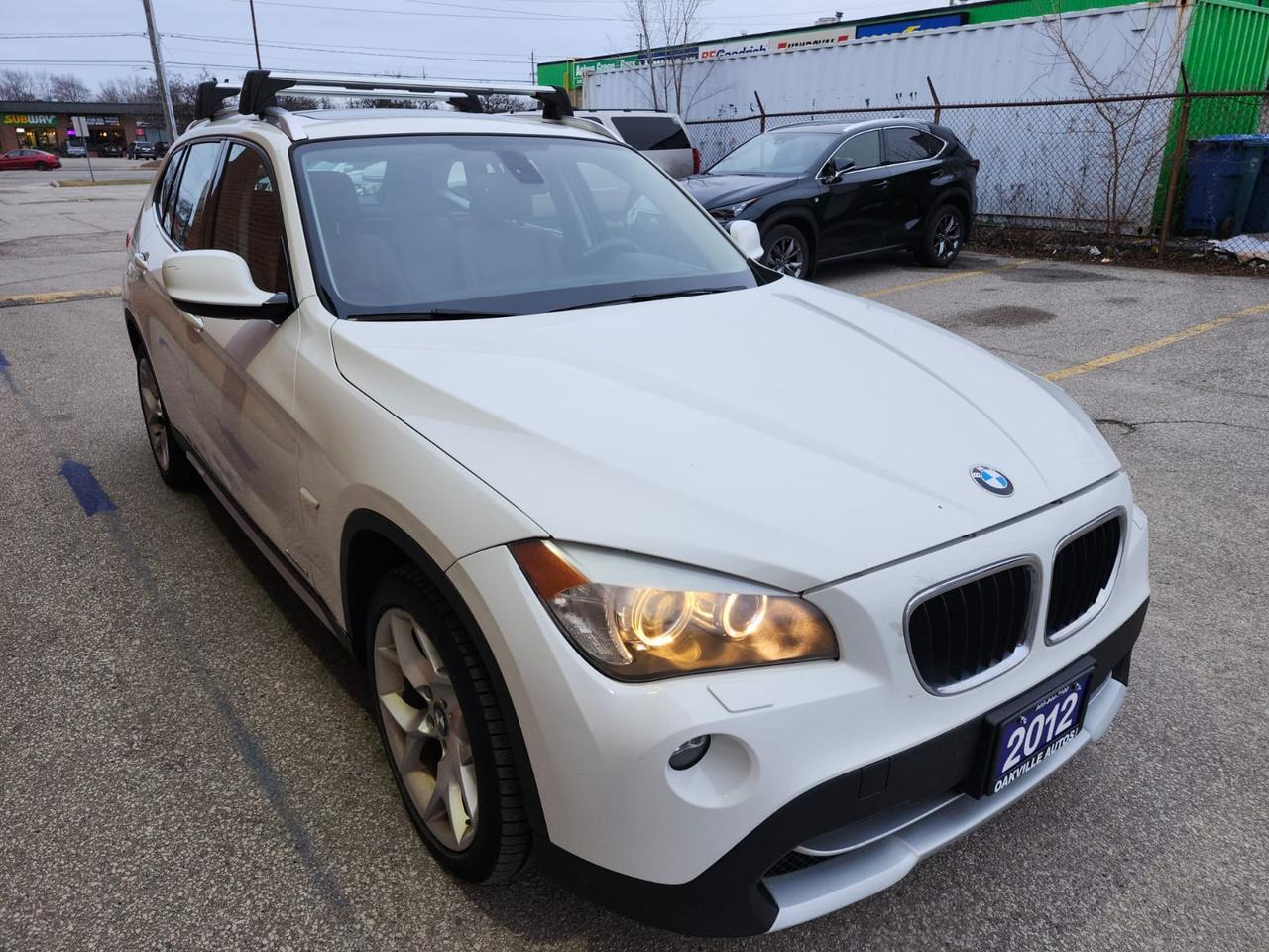 2012 BMW X1 Navigation, Pano Roof, AWD 4dr 28i Photo