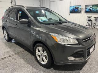 <div><b>Embark on a journey filled with excitement with this used 2016 Ford Escape SE 4WD. This versatile SUV is designed to cater to your adventurous spirit while providing the comfort and technology you need for daily driving. With its sleek grey exterior and charcoal black cloth interior, it presents a sophisticated yet robust appearance.</b></div><br /><div><b><br></b></div><br /><div><b>Performance and Handling:</b></div><br /><div><b>- Powered by a lively 1.6L EcoBoost 4-cylinder engine that delivers efficient power.</b></div><br /><div><b>- Smooth and responsive 6-speed automatic transmission for effortless driving.</b></div><br /><div><b>- All-Wheel Drive (4WD) system that enhances traction and stability in various road conditions.</b></div><br /><div><b>- 17-inch aluminum wheels contribute to a smooth and controlled ride, ensuring that every journey is a pleasure.</b></div><br /><div><b><br></b></div><br /><div><b>Comfort and Convenience:</b></div><br /><div><b>- Heated front seats provide warmth and comfort during colder days, making your commute more pleasant.</b></div><br /><div><b>- A rear-view camera that enhances safety by offering a clear view while reversing, making parking easier and safer.</b></div><br /><div><b>- The SYNC enhanced voice recognition communications and entertainment system keeps you connected and entertained on the go.</b></div><br /><div><b>- USB port for seamless device integration, keeping your gadgets connected and charged.</b></div><br /><div><b>- Securicode entry keypad and remote keyless entry for easy access to the vehicle without fumbling for keys.</b></div><br /><div><b>- Remote start feature allows you to warm up or cool down the cabin before you get in, ensuring optimal comfort from the moment you step inside.</b></div><br /><div><b><br></b></div><br /><div><b>Safety and Security:</b></div><br /><div><b>- Child Safety Locks to protect your little ones.</b></div><br /><div><b>- Anti-lock Brakes / ABS and Assisted Braking to help maintain control under hard braking situations.</b></div><br /><div><b>- Traction Control and Vehicle Stability Management VSM to help keep the vehicle stable and secure.</b></div><br /><div><b>- Airbag system including a driver side airbag and a passenger front airbag with an on/off switch for added safety.</b></div><br /><div><b><br></b></div><br /><div><b>Exterior and Lighting:</b></div><br /><div><b>- Smart / Active Cornering Headlights that improve visibility on winding roads.</b></div><br /><div><b>- Fog Lights to enhance visibility in challenging weather conditions.</b></div><br /><div><b>- A rear spoiler that adds a sporty touch and may improve aerodynamics.</b></div><br /><div><b>- Alloy / Aluminum Wheels that add to the vehicles aesthetic appeal.</b></div><br /><div><b>- Rear Defrost and Rear Window Wiper to maintain clear visibility in all weather conditions.</b></div><br /><div><b><br></b></div><br /><div><b>With an emphasis on providing a stress-free customer experience, Sisson Auto includes a Certified 3-month 6000km Powertrain Warranty with 24 Hour Roadside Assistance for added peace of mind.</b></div><br /><div><b><br></b></div><br /><div><b>In summary, the 2016 Ford Escape SE 4WD isnt just a vehicle; its an invitation to put adventure in the fast lane. With a perfect blend of performance, comfort, and modern features, this Escape is ready to elevate your driving experience. Get ready to explore the open road with style and confidence.</b></div><br /><div><b>** This description was written by AI based on information provided about the vehicle. AI can sometimes produce incorrect information. Please confirm all details with the dealership. </b></div>