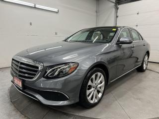 ONLY 28,000 KMS!! STUNNING 330HP E400 ALL-WHEEL DRIVE W/ PREMIUM, LUXURY AND EXCLUSIVE PACKAGES INCL. PANORAMIC SUNROOF, HEATED LEATHER SEATS & STEERING, EXCLUSIVE EXTERIOR STYLING, PANEL HEATING, BLIND SPOT ASSIST, ACTIVE BRAKE ASSIST, MASSIVE 12.3-IN TOUCHSCREEN W/ NAVIGATION, BURMESTER PREMIUM AUDIO, COMFORT SUSPENSION AND 18-IN ALLOYS! Backup camera w/ front & rear park sensors, Apple CarPlay/Android Auto, power seats & steering column w/ memory system, rain-sensing wipers, paddle shifters, ambient lighting, power liftgate, belt tensioner, drive mode select, keyless-go, dual-zone climate control, auto headlights, auto dimming rearview mirror, garage door opener, cruise control, Bluetooth and Sirius XM!