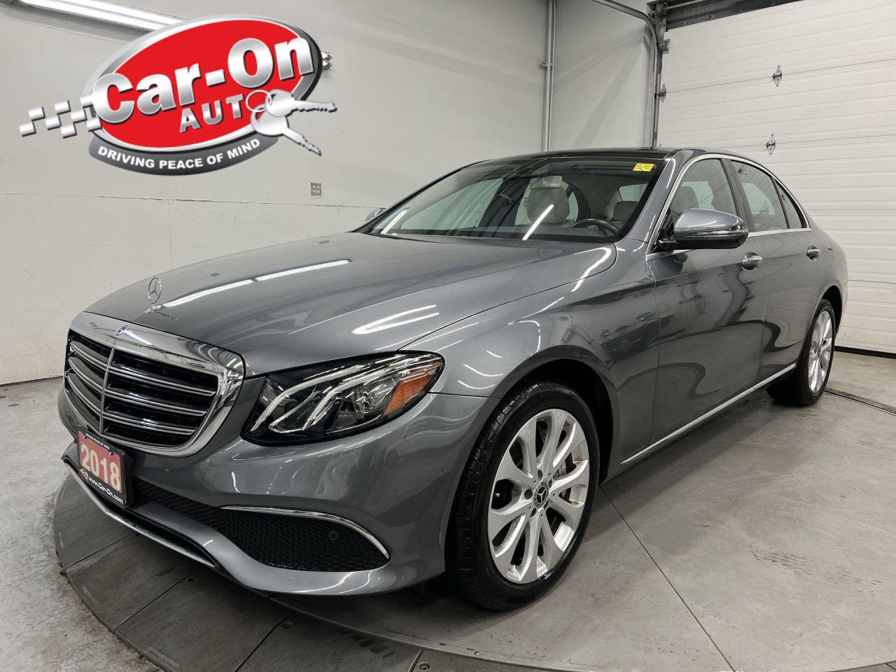 ONLY 28,000 KMS!! STUNNING 330HP E400 ALL-WHEEL DRIVE W/ PREMIUM, LUXURY AND EXCLUSIVE PACKAGES INCL. PANORAMIC SUNROOF, HEATED LEATHER SEATS & STEERING, EXCLUSIVE EXTERIOR STYLING, PANEL HEATING, BLIND SPOT ASSIST, ACTIVE BRAKE ASSIST, MASSIVE 12.3-IN TOUCHSCREEN W/ NAVIGATION, BURMESTER PREMIUM AUDIO, COMFORT SUSPENSION AND 18-IN ALLOYS! Backup camera w/ front & rear park sensors, Apple CarPlay/Android Auto, power seats & steering column w/ memory system, rain-sensing wipers, paddle shifters, ambient lighting, power liftgate, belt tensioner, drive mode select, keyless-go, dual-zone climate control, auto headlights, auto dimming rearview mirror, garage door opener, cruise control, Bluetooth and Sirius XM!