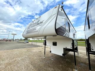 <p><strong>Optional Equipment:</strong></p><p>Fox Landing</p><p>Coleman Mach 11K BTU AC</p><p>Deep Drawer Under Cooktop</p><p><strong>Standard Features:</strong></p><p>Wolf Pack: Electric Awning, AM/FM Stereo W/Bluetooth, Electric Jacks, 8 Cu Ft 12V Refrigerator, Dual 20# LP Tanks, Exterior Shower, Heated, Enclosed Holding Tanks, Roof Rack and Ladder, Utility Light, Premium Fan Vent, Combo Bunk Cab with Dinette Light, Range & Sink Cover</p><p>Fully Welded, Thick Wall Aluminum Frame Construction, Corona Treated Fiberglass, Laminated Walls, High Density Block Foam Insulation, Aerodynamic Fiberglass Front Nose Cap, Thermal Pane Windows, Diamond Plate Armor</p><p>Dual Battery Compartment, LED Lighting, SolX4 400W Solar Package, LPG Quick Connect, Battery Disconnect, Magnetic Storage Door Catches, Marine Detachable Storage Cord, 6 Gal Gas/Elec Water Heater, 20K BTU Furnace w/Digital T-Stat, Interior Command Center, Microwave, 3 Burner Cooktop, Range Hood w/Exhaust Fan, Fabric Night Shades, Bathroom Skylight, Bedroom Reading Lights, USB Charge Ports, Queen Mattress</p>