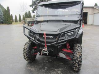 <p>NEW INVENTORY ALERT!</p><p> </p><p>2018 HONDA PIONEER 1000-5 LTD</p><p>4X4 SIDE-BY-SIDE OFF-ROAD VEHICLE</p><p> </p><p>FEATURES:</p><p>SEATING FOR 5 PASSENGERS WITH SEATBELTS.</p><p>FRONT-END TOW WENCH AND REAR TRAILER HITCH INSTALLED </p><p>FRONT-END SNOWPLOW ATTACHEMENT AND SNOWPLOW BLADE INCLUDED </p><p>OPTIONAL WINDSHEILD AND ROOF </p><p>ONLY 200 KMS!</p><p> </p><p>FOR ONLY $22,995.00!!</p><p> </p><p>YOUR SUMMER ADVENTURE AWAITS! DONT MISS OUT ON ALL THE OUTDOOR FUN AND CALL US TODAY! </p><p> </p><p>The pricing listed above does NOT include HST and Licensing </p><p> </p><p>A carfax is also provided to verify prior maintenance, servicing, and/or accident reports and claims history. </p><p> </p><p>WE accept Bad Credit, Good Credit and NO CREDIT! </p><p> </p><p>Our business will expedite all public and private financial lender options to accommodate your financial needs if required to purchase the vehicle of your dreams!</p><p> </p><p>Various vehicle warranties are available upon request and purchase of the vehicle. </p><p> </p><p>We ensure complete customer satisfaction GUARANTEE! Our family owned and operated business has happily been servicing the NIAGARA, HAMILTON, HALTON, TORONTO and GTA region(s) for over 25 YEARS!</p><p> </p><p>If you are interested in/or require further information call us at (905) 572-5559 and book an appointment to view and test drive this vehicle with one of our trusted and OMVIC certified sales persons TODAY!</p>