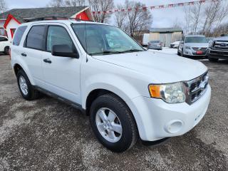 <p><span style=font-size: 14pt;>2009 Ford Escape XLT 4x4 Automatic with 4 almost new Bridgestone tires. White with Tan interior absolutely gorgeous. Its a must see. Never been in any accidents, clean carfax. Comes certified at $6850 plus tax. Please call us for an appointment to see this suv.</span></p>