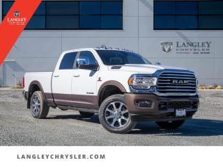 <p><strong><span style=font-family:Arial; font-size:18px;>Reawaken your passion for the open road with our unbeatable selection of cars at Langley Chrysler..</span></strong></p> <p><strong><span style=font-family:Arial; font-size:18px;>Among the shining stars of our inventory is the brand new 2024 RAM 3500 Limited Longhorn..</span></strong> <br> This isnt just a pickup truck; its a statement of your unyielding commitment to power and luxury.. This pickup truck embodies unrivalled strength, wrapped in a seductive white exterior that captures the essence of elegance and resilience.</p> <p><strong><span style=font-family:Arial; font-size:18px;>The interior, a sophisticated blend of brown leather upholstery and genuine wood inserts, creates an inviting atmosphere that elevates every journey..</span></strong> <br> Experience the precision of a 6.7L 6-cylinder engine mated to a 6-speed automatic transmission, promising a smooth and confident ride.. With adjustable pedals and traction control, navigating through any terrain becomes a thrilling adventure rather than a challenge.</p> <p><strong><span style=font-family:Arial; font-size:18px;>The RAM 3500 is not just about muscle; its also about comfort and convenience..</span></strong> <br> It comes equipped with memory seats, an automatic temperature control system, and a navigation system.. The front dual-zone A/C ensures optimal comfort for you and your passengers.</p> <p><strong><span style=font-family:Arial; font-size:18px;>The 1-touch up and down feature and power windows add to the convenience, making every drive enjoyable..</span></strong> <br> Safety is paramount in this RAM 3500. With ABS brakes, airbags, electronic stability, and a security system, you can rest assured that you and your crew are well-protected.. The auto-dimming rearview mirror and high-beam headlights guarantee clear vision, ensuring safer night-time driving.</p> <p><strong><span style=font-family:Arial; font-size:18px;>This isnt just a vehicle; its a lifestyle..</span></strong> <br> The fully automatic headlights, fog lights, rain-sensing wipers, and turn signal indicator mirrors not only add to the aesthetic appeal but also enhance safety and visibility.. The RAM 3500 Limited Longhorn is more than just a pickup truck.</p> <p><strong><span style=font-family:Arial; font-size:18px;>It is a symbol of luxury, power, and prestige, and it is waiting for you at Langley Chrysler..</span></strong> <br> Dont just love your car love buying it! 

At Langley Chrysler, we make your buying experience as luxurious as the car itself.. We believe in making our customers feel special because you deserve nothing but the best.</p> <p><strong><span style=font-family:Arial; font-size:18px;>This 2024 RAM 3500 Limited Longhorn is not just brand new; its the start of a new chapter in your journey on the open road..</span></strong> <br> Come, drive the difference at Langley Chrysler.. Because you deserve a vehicle that stands out just as much as you do.</p> <p><strong><span style=font-family:Arial; font-size:18px;>The 2024 RAM 3500 Limited Longhorn, where luxury meets power..</span></strong> <br> Your journey awaits</p>Documentation Fee $968, Finance Placement $628, Safety & Convenience Warranty $699

<p>*All prices are net of all manufacturer incentives and/or rebates and are subject to change by the manufacturer without notice. All prices plus applicable taxes, applicable environmental recovery charges, documentation of $599 and full tank of fuel surcharge of $76 if a full tank is chosen.<br />Other items available that are not included in the above price:<br />Tire & Rim Protection and Key fob insurance starting from $599<br />Service contracts (extended warranties) for up to 7 years and 200,000 kms starting from $599<br />Custom vehicle accessory packages, mudflaps and deflectors, tire and rim packages, lift kits, exhaust kits and tonneau covers, canopies and much more that can be added to your payment at time of purchase<br />Undercoating, rust modules, and full protection packages starting from $199<br />Flexible life, disability and critical illness insurances to protect portions of or the entire length of vehicle loan?im?im<br />Financing Fee of $500 when applicable<br />Prices shown are determined using the largest available rebates and incentives and may not qualify for special APR finance offers. See dealer for details. This is a limited time offer.</p>