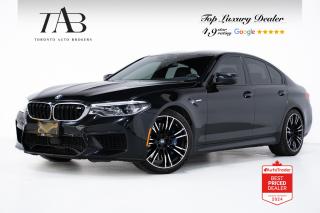 This beautiful 2019 BMW M5 V8 is a local Ontario vehicle with a clean Carfax report. Feel the power of its roaring V8 engine as you cruise with unparalleled luxury, accompanied by the symphony of the Harman Kardon sound system.

Key features Include:

Remote Engine Start
M Sport Exhaust System
22" M Lt/Aly Wheels, Double-Spoke 742M, Bicolour, Perf Non-RFT
M Sport Brakes
Sport Auto Trans w/Paddles
Tire Pressure Monitor
Tire Repair Kit
Adaptive 2-axle air suspension
Without Exterior Lines Designation
High Gloss Black Roof Rails
Universal Remote Control
Comfort Access
Soft Close Doors
M Sport Package
Travel and Comfort System
Seat Heating, Front and Rear
Heat Comfort Package, Front
Aluminum "Mesh Effect" Trim
Auto 4-Zone Climate Control
Massage Function for Driver and Passenger
Auto-Dimming Exterior Mirrors
Ambient Lighting
Side Sunshades
Sun Protection Glazing
Velour Floor Mats
Heated and Cooled Cupholders
Ventilated Seats
Comfort Seats, Front
High-Beam Assistant
Active Protection
Decoding for high-beam assistance
Driving Assistant
Active Guard - Frontal Collision Warning
BMW Laserlight Headlights
LED Fog Lights
Parking Assistant Plus w/Surround View
Km/h Speedometer
ConnectedDrive Services
Apple CarPlay Preparation

NOW OFFERING 3 MONTH DEFERRED FINANCING PAYMENTS ON APPROVED CREDIT. 

Looking for a top-rated pre-owned luxury car dealership in the GTA? Look no further than Toronto Auto Brokers (TAB)! Were proud to have won multiple awards, including the 2023 GTA Top Choice Luxury Pre Owned Dealership Award, 2023 CarGurus Top Rated Dealer, 2024 CBRB Dealer Award, the Canadian Choice Award 2024,the 2024 BNS Award, the 2023 Three Best Rated Dealer Award, and many more!

With 30 years of experience serving the Greater Toronto Area, TAB is a respected and trusted name in the pre-owned luxury car industry. Our 30,000 sq.Ft indoor showroom is home to a wide range of luxury vehicles from top brands like BMW, Mercedes-Benz, Audi, Porsche, Land Rover, Jaguar, Aston Martin, Bentley, Maserati, and more. And we dont just serve the GTA, were proud to offer our services to all cities in Canada, including Vancouver, Montreal, Calgary, Edmonton, Winnipeg, Saskatchewan, Halifax, and more.

At TAB, were committed to providing a no-pressure environment and honest work ethics. As a family-owned and operated business, we treat every customer like family and ensure that every interaction is a positive one. Come experience the TAB Lifestyle at its truest form, luxury car buying has never been more enjoyable and exciting!

We offer a variety of services to make your purchase experience as easy and stress-free as possible. From competitive and simple financing and leasing options to extended warranties, aftermarket services, and full history reports on every vehicle, we have everything you need to make an informed decision. We welcome every trade, even if youre just looking to sell your car without buying, and when it comes to financing or leasing, we offer same day approvals, with access to over 50 lenders, including all of the banks in Canada. Feel free to check out your own Equifax credit score without affecting your credit score, simply click on the Equifax tab above and see if you qualify.

So if youre looking for a luxury pre-owned car dealership in Toronto, look no further than TAB! We proudly serve the GTA, including Toronto, Etobicoke, Woodbridge, North York, York Region, Vaughan, Thornhill, Richmond Hill, Mississauga, Scarborough, Markham, Oshawa, Peteborough, Hamilton, Newmarket, Orangeville, Aurora, Brantford, Barrie, Kitchener, Niagara Falls, Oakville, Cambridge, Kitchener, Waterloo, Guelph, London, Windsor, Orillia, Pickering, Ajax, Whitby, Durham, Cobourg, Belleville, Kingston, Ottawa, Montreal, Vancouver, Winnipeg, Calgary, Edmonton, Regina, Halifax, and more.

Call