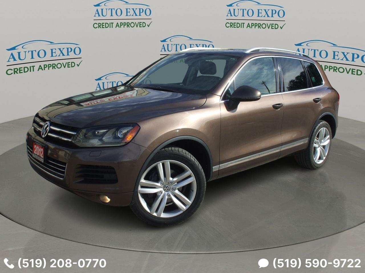 <p>Auto, A/C, TDI, ( Diesel ), AWD, Leather, Loaded, Push Starter, Power Group, Sunroof, GPS, Bluetooth, Heated Front & Rear Seats, Power Front Seats, Power Lift Gate, Fog Lights, Alloys, Tinted, Local Trade-in, Ontario Car, Clean Carfax, Tons of Service Record on Carfax, No Accident, None Smoker, No Rust, Perfect Running Condition, Must See!!!</p><p><span style=font-size: 14pt; font-weight: bolder; font-family: Inter, ui-sans-serif, system-ui, -apple-system, BlinkMacSystemFont, Segoe UI, Roboto, Helvetica Neue, Arial, Noto Sans, sans-serif, Apple Color Emoji, Segoe UI Emoji, Segoe UI Symbol, Noto Color Emoji;>We Finance,,,</span></p><p style=border: 0px solid #e5e7eb; box-sizing: border-box; --tw-translate-x: 0; --tw-translate-y: 0; --tw-rotate: 0; --tw-skew-x: 0; --tw-skew-y: 0; --tw-scale-x: 1; --tw-scale-y: 1; --tw-scroll-snap-strictness: proximity; --tw-ring-offset-width: 0px; --tw-ring-offset-color: #fff; --tw-ring-color: rgba(59,130,246,.5); --tw-ring-offset-shadow: 0 0 #0000; --tw-ring-shadow: 0 0 #0000; --tw-shadow: 0 0 #0000; --tw-shadow-colored: 0 0 #0000; margin: 0px; font-family: Inter, ui-sans-serif, system-ui, -apple-system, BlinkMacSystemFont, Segoe UI, Roboto, Helvetica Neue, Arial, Noto Sans, sans-serif, Apple Color Emoji, Segoe UI Emoji, Segoe UI Symbol, Noto Color Emoji;><span style=border: 0px solid #e5e7eb; box-sizing: border-box; --tw-translate-x: 0; --tw-translate-y: 0; --tw-rotate: 0; --tw-skew-x: 0; --tw-skew-y: 0; --tw-scale-x: 1; --tw-scale-y: 1; --tw-scroll-snap-strictness: proximity; --tw-ring-offset-width: 0px; --tw-ring-offset-color: #fff; --tw-ring-color: rgba(59,130,246,.5); --tw-ring-offset-shadow: 0 0 #0000; --tw-ring-shadow: 0 0 #0000; --tw-shadow: 0 0 #0000; --tw-shadow-colored: 0 0 #0000; font-weight: bolder; font-size: 18px; color: #333333;>OMVIC Licensed, UCDA & Carfax Member,,,</span></p><p style=border: 0px solid #e5e7eb; box-sizing: border-box; --tw-translate-x: 0; --tw-translate-y: 0; --tw-rotate: 0; --tw-skew-x: 0; --tw-skew-y: 0; --tw-scale-x: 1; --tw-scale-y: 1; --tw-scroll-snap-strictness: proximity; --tw-ring-offset-width: 0px; --tw-ring-offset-color: #fff; --tw-ring-color: rgba(59,130,246,.5); --tw-ring-offset-shadow: 0 0 #0000; --tw-ring-shadow: 0 0 #0000; --tw-shadow: 0 0 #0000; --tw-shadow-colored: 0 0 #0000; margin: 0px; font-family: Inter, ui-sans-serif, system-ui, -apple-system, BlinkMacSystemFont, Segoe UI, Roboto, Helvetica Neue, Arial, Noto Sans, sans-serif, Apple Color Emoji, Segoe UI Emoji, Segoe UI Symbol, Noto Color Emoji;>We specialize in domestic and import vehicles! Our wide selection offers something for every need and budget! Visit us @ 450 Belmont Ave West, Kitchener!</p><p style=border: 0px solid #e5e7eb; box-sizing: border-box; --tw-translate-x: 0; --tw-translate-y: 0; --tw-rotate: 0; --tw-skew-x: 0; --tw-skew-y: 0; --tw-scale-x: 1; --tw-scale-y: 1; --tw-scroll-snap-strictness: proximity; --tw-ring-offset-width: 0px; --tw-ring-offset-color: #fff; --tw-ring-color: rgba(59,130,246,.5); --tw-ring-offset-shadow: 0 0 #0000; --tw-ring-shadow: 0 0 #0000; --tw-shadow: 0 0 #0000; --tw-shadow-colored: 0 0 #0000; margin: 0px; font-family: Inter, ui-sans-serif, system-ui, -apple-system, BlinkMacSystemFont, Segoe UI, Roboto, Helvetica Neue, Arial, Noto Sans, sans-serif, Apple Color Emoji, Segoe UI Emoji, Segoe UI Symbol, Noto Color Emoji;>&nbsp;</p><p>Looking for a luxurious and capable SUV thats ready for adventure? Look no further than this 2012 Volkswagen Touareg TDI Highline, available at Auto Expo Inc.! This certified pre-owned Touareg boasts a sleek brown exterior and a sophisticated black leather interior, offering both style and comfort. With its powerful 6-cylinder diesel engine and all-wheel drive, this SUV is sure to handle any terrain with ease, while its automatic transmission ensures a smooth and effortless ride.</p><p>This Touareg is loaded with features designed to enhance your driving experience. Enjoy the convenience of GPS navigation, heated seats and mirrors, a sunroof, and a premium sound system. With a folding rear seat, youll have plenty of cargo space for all your adventures. This Touareg has been meticulously maintained and has 195,000km on the odometer, proving its reliability and durability.</p><p><strong>Here are five features that make this Touareg stand out:</strong></p><ul><li><strong>Certified Pre-Owned:</strong> Enjoy peace of mind with a certified pre-owned vehicle that meets rigorous standards.</li><li><strong>TDI Diesel Power:</strong> Experience impressive fuel efficiency and powerful torque with the efficient and reliable TDI diesel engine.</li><li><strong>All-Wheel Drive:</strong> Conquer any terrain with confidence, thanks to the Touaregs advanced all-wheel drive system.</li><li><strong>Luxurious Leather Interior:</strong> Indulge in comfort and style with the premium leather seats and sophisticated interior appointments.</li><li><strong>Tech-Forward Features:</strong> Stay connected and entertained with features like GPS navigation, Bluetooth connectivity, and a premium sound system.</li></ul><p><em>Powered by Turbo Diesel Engine,,,</em></p>