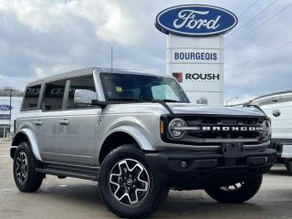 <b>Leather Seats, 360-Degree Camera, Wireless Charging, Navigation, Heated Steering Wheel!</b><br> <br> <br> <br>  Turn heads with this stylish yet remarkably capable 2024 Ford Bronco. <br> <br>With a nostalgia-inducing design along with remarkable on-road driving manners with supreme off-road capability, this 2024 Ford Bronco is indeed a jack of all trades and masters every one of them. Durable build materials and functional engineering coupled with modern day infotainment and driver assistive features ensure that this iconic vehicle takes on whatever you can throw at it. Want an SUV that can genuinely do it all and look good while at it? Look no further than this 2024 Ford Bronco!<br> <br> This iconic silver metallic SUV  has a 10 speed automatic transmission and is powered by a  275HP 2.3L 4 Cylinder Engine.<br> <br> Our Broncos trim level is Outer Banks. This Bronco Outer Banks takes things to a whole new level, with polished aluminum wheels, body colored fender flares, door handles and power heated side mirrors, along with LED headlights with high beam assist, front fog lights, and upgraded LED brake lights. This rugged off-roader also treats you with amazing comfort and connectivity features that include heated front seats, remote engine start, dual-zone climate control, front and rear cupholders, and an upgraded infotainment system with Apple CarPlay, Android Auto, SiriusXM and inbuilt navigation, to get you back home from your off-road adventures. Road safety is assured thanks to a suite of systems including blind spot detection, pre-collision assist with pedestrian detection and cross-traffic alert, lane keeping assist with lane departure warning, rear parking sensors, and driver monitoring alert. Additional features include proximity keyless entry with push button start, trail control, trail turn assist, and so much more. This vehicle has been upgraded with the following features: Leather Seats, 360-degree Camera, Wireless Charging, Navigation, Heated Steering Wheel, 18 Aluminum Wheels, Adaptive Cruise Control. <br><br> View the original window sticker for this vehicle with this url <b><a href=http://www.windowsticker.forddirect.com/windowsticker.pdf?vin=1FMDE8BH9RLA10456 target=_blank>http://www.windowsticker.forddirect.com/windowsticker.pdf?vin=1FMDE8BH9RLA10456</a></b>.<br> <br>To apply right now for financing use this link : <a href=https://www.bourgeoismotors.com/credit-application/ target=_blank>https://www.bourgeoismotors.com/credit-application/</a><br><br> <br/> 7.99% financing for 84 months.  Incentives expire 2024-05-23.  See dealer for details. <br> <br>Discount on vehicle represents the Cash Purchase discount applicable and is inclusive of all non-stackable and stackable cash purchase discounts from Ford of Canada and Bourgeois Motors Ford and is offered in lieu of sub-vented lease or finance rates. To get details on current discounts applicable to this and other vehicles in our inventory for Lease and Finance customer, see a member of our team. </br></br>Discover a pressure-free buying experience at Bourgeois Motors Ford in Midland, Ontario, where integrity and family values drive our 78-year legacy. As a trusted, family-owned and operated dealership, we prioritize your comfort and satisfaction above all else. Our no pressure showroom is lead by a team who is passionate about understanding your needs and preferences. Located on the shores of Georgian Bay, our dealership offers more than just vehiclesits an experience rooted in community, trust and transparency. Trust us to provide personalized service, a diverse range of quality new Ford vehicles, and a seamless journey to finding your perfect car. Join our family at Bourgeois Motors Ford and let us redefine the way you shop for your next vehicle.<br> Come by and check out our fleet of 80+ used cars and trucks and 190+ new cars and trucks for sale in Midland.  o~o