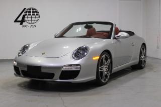 <p>An Arctic Silver Porsche 911, this Carrera cabriolet features a rear-mounted, 340 horsepower 3.8L flat-6 engine, with rear-wheel drive and a 6-speed manual transmission! Optioned on 19” Turbo wheels with a full  Carrera Red leather interior, this 997.2 generation 911 further includes integrated navigation, a Bose sound system, painted interior trim, power-adjustable heated front seats, and Sport Chrono Package!</p>

<p>World Fine Cars Ltd. has been in business for over 40 years and maintains over 90 pre-owned vehicles in inventory at all times. Every certified retailed vehicle will have a 3 Month 3000 KM POWERTRAIN WARRANTY WITH SEALS AND GASKETS COVERAGE, with our compliments (conditions apply please contact for details). CarFax Reports are always available at no charge. We offer a full service center and we are able to service everything we sell. With a state of the art showroom including a comfortable customer lounge with WiFi access. We invite you to contact us today 1-888-334-2707 www.worldfinecars.com</p>
