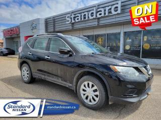 <b>Rear View Camera,  SiriusXM,  Air Conditioning,  Power Windows,  Power Doors!</b><br> <br>  Compare at $16489 - Our Price is just $15291! <br> <br>   Whether youre running errands around town or eating up miles on the highway, this Nissan Rogue is a capable companion. This  2015 Nissan Rogue is for sale today in Swift Current. <br> <br>Take on a bigger, bolder world. Get there in a compact crossover that brings a stylish look to consistent capability. Load up in a snap with an interior that adapts for adventure. Excellent safety ratings let you enjoy the drive with confidence while great fuel economy lets your adventure go further. Slide into gear and explore a life of possibilities in this Nissan Rogue. It gives you more than you expect and everything you deserve. This  SUV has 196,479 kms. Its  super black in colour  . It has a cvt transmission and is powered by a  170HP 2.5L 4 Cylinder Engine.  <br> <br> Our Rogues trim level is S. This Nissan Rogue S is a versatile crossover at a great value. It comes with Bluetooth hands-free phone system, SiriusXM, a USB port, a rearview camera, a folding, sliding, reclining second-row bench seat, air conditioning, power windows, power doors, eco mode, roof rails, power, heated mirrors, and more. This vehicle has been upgraded with the following features: Rear View Camera,  Siriusxm,  Air Conditioning,  Power Windows,  Power Doors,  Bluetooth. <br> <br>To apply right now for financing use this link : <a href=https://www.standardnissan.ca/finance/apply-for-financing/ target=_blank>https://www.standardnissan.ca/finance/apply-for-financing/</a><br><br> <br/><br>Why buy from Standard Nissan in Swift Current, SK? Our dealership is owned & operated by a local family that has been serving the automotive needs of local clients for over 110 years! We rely on a reputation of fair deals with good service and top products. With your support, we are able to give back to the community. <br><br>Every retail vehicle new or used purchased from us receives our 5-star package:<br><ul><li>*Platinum Tire & Rim Road Hazzard Coverage</li><li>**Platinum Security Theft Prevention & Insurance</li><li>***Key Fob & Remote Replacement</li><li>****$20 Oil Change Discount For As Long As You Own Your Car</li><li>*****Nitrogen Filled Tires</li></ul><br>Buyers from all over have also discovered our customer service and deals as we deliver all over the prairies & beyond!#BetterTogether<br> Come by and check out our fleet of 40+ used cars and trucks and 40+ new cars and trucks for sale in Swift Current.  o~o