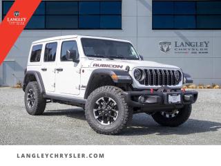<p><strong><span style=font-family:Arial; font-size:18px;>Unravel the thrill of innovation and elegance, where speed meets style in a symphony of power and performance, with the 2024 Jeep Wrangler Rubicon..</span></strong></p> <p><strong><span style=font-family:Arial; font-size:18px;>This stunning SUV is everything a modern vehicle should embody and more..</span></strong> <br> Bedecked in a pristine white exterior that glistens in the sunlight, this rugged beauty radiates a bold persona that is sure to turn heads.. The interior, a contrasting black, is a haven of comfort and luxury that will make you feel like royalty.</p> <p><strong><span style=font-family:Arial; font-size:18px;>The 8-speed automatic transmission paired with a robust 3.6L 6-cylinder engine ensures an exhilarating driving experience like no other..</span></strong> <br> And guess what? Its brand new, never driven, ready and waiting for you to take the first plunge into the realm of adventure.. Immerse yourself in a suite of top-tier features designed with you in mind.</p> <p><strong><span style=font-family:Arial; font-size:18px;>From the traction control for those tricky terrains to the tachometer that keeps you informed, every detail is meticulously crafted..</span></strong> <br> The automatic temperature control and dual-zone A/C will keep you cool while the heated door mirrors ensure optimum visibility no matter the weather.. But thats not all! The Jeep Wrangler Rubicon is not just about brute strength and advanced tech.</p> <p><strong><span style=font-family:Arial; font-size:18px;>It places your safety paramount with a slew of protective measures such as ABS brakes, dual front impact airbags, electronic stability, and more..</span></strong> <br> Youre cocooned in a fortress of safety while you conquer the roads.. You know what they say, Spring is coming! and what better way to greet the season than in your new Jeep Wrangler Rubicon.</p> <p><strong><span style=font-family:Arial; font-size:18px;>Imagine the blooming flowers reflecting off your shiny white exterior as you cruise down the road..</span></strong> <br> And heres a funny fact  did you know that the 2024 Jeep Wrangler Rubicon can make spring come faster? Well, not scientifically but with the joy it brings, it sure feels like it!

So why wait? Your brand new, never driven, 2024 Jeep Wrangler Rubicon is waiting for you at Langley Chrysler.. Stand out from the crowd, embrace the spirit of spring, and start creating unforgettable moments with your new ride</p>Documentation Fee $968, Finance Placement $628, Safety & Convenience Warranty $699

<p>*All prices are net of all manufacturer incentives and/or rebates and are subject to change by the manufacturer without notice. All prices plus applicable taxes, applicable environmental recovery charges, documentation of $599 and full tank of fuel surcharge of $76 if a full tank is chosen.<br />Other items available that are not included in the above price:<br />Tire & Rim Protection and Key fob insurance starting from $599<br />Service contracts (extended warranties) for up to 7 years and 200,000 kms starting from $599<br />Custom vehicle accessory packages, mudflaps and deflectors, tire and rim packages, lift kits, exhaust kits and tonneau covers, canopies and much more that can be added to your payment at time of purchase<br />Undercoating, rust modules, and full protection packages starting from $199<br />Flexible life, disability and critical illness insurances to protect portions of or the entire length of vehicle loan?im?im<br />Financing Fee of $500 when applicable<br />Prices shown are determined using the largest available rebates and incentives and may not qualify for special APR finance offers. See dealer for details. This is a limited time offer.</p>