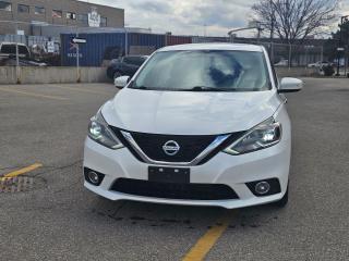 <p>Fully loaded, Nissan Sentra SR model, comes certified, features leather, sunroof, power seats locks and windows, push button start, reverse camera, bluetooth, and much more!<br /><br />Price does not include licensing and HST</p><p> </p>