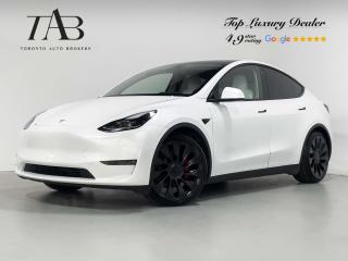 This Powerful 2023 Tesla Model Y Performance is a Canadian vehicle with a clean Carfax report and a remaining manufacture warranty until November 8, 2026 or 80,000kms. It is a cutting-edge electric SUV known for its impressive acceleration, advanced technology, and spacious interior.

Key Features Includes:

- Performance 
- Dual Motor
- Autopilot
- Navigation
- Bluetooth
- Backup Camera
- Parking Sensors
- Moonroof
- Spotify
- Apple Music
- Zoom
- Theater ( Netflix, Youtube, Disney+ )
- Heated Front and Rear Seats
- Heated Steering wheel
- Cruise Control
- Automatic emergency braking
- Red Brake Calipers
- 21" Alloy Wheels 


NOW OFFERING 3 MONTH DEFERRED FINANCING PAYMENTS ON APPROVED CREDIT. 

Looking for a top-rated pre-owned luxury car dealership in the GTA? Look no further than Toronto Auto Brokers (TAB)! Were proud to have won multiple awards, including the 2023 GTA Top Choice Luxury Pre Owned Dealership Award, 2023 CarGurus Top Rated Dealer, 2024 CBRB Dealer Award, the Canadian Choice Award 2024,the 2024 BNS Award, the 2023 Three Best Rated Dealer Award, and many more!

With 30 years of experience serving the Greater Toronto Area, TAB is a respected and trusted name in the pre-owned luxury car industry. Our 30,000 sq.Ft indoor showroom is home to a wide range of luxury vehicles from top brands like BMW, Mercedes-Benz, Audi, Porsche, Land Rover, Jaguar, Aston Martin, Bentley, Maserati, and more. And we dont just serve the GTA, were proud to offer our services to all cities in Canada, including Vancouver, Montreal, Calgary, Edmonton, Winnipeg, Saskatchewan, Halifax, and more.

At TAB, were committed to providing a no-pressure environment and honest work ethics. As a family-owned and operated business, we treat every customer like family and ensure that every interaction is a positive one. Come experience the TAB Lifestyle at its truest form, luxury car buying has never been more enjoyable and exciting!

We offer a variety of services to make your purchase experience as easy and stress-free as possible. From competitive and simple financing and leasing options to extended warranties, aftermarket services, and full history reports on every vehicle, we have everything you need to make an informed decision. We welcome every trade, even if youre just looking to sell your car without buying, and when it comes to financing or leasing, we offer same day approvals, with access to over 50 lenders, including all of the banks in Canada. Feel free to check out your own Equifax credit score without affecting your credit score, simply click on the Equifax tab above and see if you qualify.

So if youre looking for a luxury pre-owned car dealership in Toronto, look no further than TAB! We proudly serve the GTA, including Toronto, Etobicoke, Woodbridge, North York, York Region, Vaughan, Thornhill, Richmond Hill, Mississauga, Scarborough, Markham, Oshawa, Peteborough, Hamilton, Newmarket, Orangeville, Aurora, Brantford, Barrie, Kitchener, Niagara Falls, Oakville, Cambridge, Kitchener, Waterloo, Guelph, London, Windsor, Orillia, Pickering, Ajax, Whitby, Durham, Cobourg, Belleville, Kingston, Ottawa, Montreal, Vancouver, Winnipeg, Calgary, Edmonton, Regina, Halifax, and more.

Call us today or visit our website to learn more about our inventory and services. And remember, all prices exclude applicable taxes and licensing, and vehicles can be certified at an additional cost of $699.