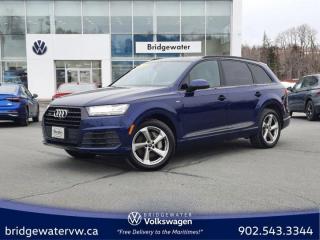 Awards:* ALG Canada Residual Value Awards New Price! Odometer is 6310 kilometers below market average! Blue 2018 Audi Q7 3.0T Technik APPLE CARPLAY | quattro | One Owner | Dealer Maint quattro 8-Speed Automatic with Tiptronic 3.0L V6 TFSI Bridgewater Volkswagen, Located in Bridgewater Nova Scotia.19 Speakers, 3.204 Axle Ratio, 3rd row seats: bench, 4-Wheel Disc Brakes, ABS brakes, Air Conditioning, Alloy wheels, AM/FM radio: SiriusXM, Auto-dimming door mirrors, Auto-dimming Rear-View mirror, Automatic temperature control, Bose 3D Surround Sound, Brake assist, Bumpers: body-colour, CD player, Compass, Delay-off headlights, Driver door bin, Driver vanity mirror, Drivers Seat Mounted Armrest, Dual front impact airbags, Dual front side impact airbags, Electronic Stability Control, Emergency communication system: Audi connect, Exterior Parking Camera Rear, Four wheel independent suspension, Front anti-roll bar, Front Bucket Seats, Front dual zone A/C, Front fog lights, Front reading lights, Fully automatic headlights, Garage door transmitter: HomeLink, Headlight cleaning, Heated door mirrors, Heated front seats, Heated rear seats, Heated steering wheel, Illuminated entry, Leather Seating Surfaces, Leather Shift Knob, Leather steering wheel, Low tire pressure warning, Memory seat, Navigation System, Occupant sensing airbag, Outside temperature display, Overhead airbag, Panic alarm, Passenger door bin, Passenger seat mounted armrest, Passenger vanity mirror, Power door mirrors, Power driver seat, Power Heated/Ventilated Front Seats, Power Liftgate, Power moonroof, Power passenger seat, Power steering, Power windows, Radio data system, Radio: Audi MMI High Navigation Plus, Rain sensing wipers, Rear air conditioning, Rear anti-roll bar, Rear dual zone A/C, Rear fog lights, Rear reading lights, Rear window defroster, Rear window wiper, Remote keyless entry, Roof rack: rails only, Security system, Speed control, Speed-sensing steering, Split folding rear seat, Spoiler, Steering wheel mounted audio controls, Tachometer, Telescoping steering wheel, Tilt steering wheel, Traction control, Trip computer, Turn signal indicator mirrors, Variably intermittent wipers, Ventilated front seats.Certification Program Details: 150 Points Inspection Fresh Oil Change Free Carfax Full Detail 2 years MVI Full Tank of Gas The 150+ point inspection includes: Engine Instrumentation Interior components Pre-test drive inspections The test drive Service bay inspection Appearance Final inspectionReviews:* According to numerous owner reviews, the Q7 attracted initial attention with its dynamic looks and high-tech cabin, while sporty handling and good overall space and ride quality helped seal the deal. Many owners note confidence imparted by the all-wheel drive system, and powerful headlights especially in inclement weather. On most aspects of handling, space, confidence, and all-weather peace of mind, the Q7 seems to have hit the mark. Source: autoTRADER.ca