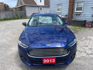 <div>2013 Ford Fusion SE package blue with black interior has clean carfax no accidents reported comes power windows and locks leather seats power seats keyless entry alloys full set of winter tires on rims assurant coast to coast 6 months 6000 km warranty looks and runs great </div>