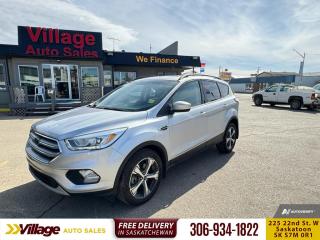 <b>Bluetooth,  Heated Seats,  Rear View Camera,  SiriusXM,  Aluminum Wheels!</b><br> <br> We sell high quality used cars, trucks, vans, and SUVs in Saskatoon and surrounding area.<br> <br>   Canadians love small crossovers.  With over 48,000 Ford Escapes sold last year in Canada, you have to have a closer look at this leader in this segment. This  2017 Ford Escape is for sale today. <br> <br>For 2017, the Escape has under gone a small refresh, updating the exterior with a more angular tailgate, LED tail lights, an aluminum hood and a new fascia that makes it look similar to the other Ford crossovers.  Inside, the Escape now comes with an electric E brake, which frees up the centre console for more cargo and arm space.This  SUV has 122,756 kms. Its  silver in colour  . It has a 6 speed automatic transmission and is powered by a  245HP 2.0L 4 Cylinder Engine.  <br> <br> Our Escapes trim level is SE. This Escape SE offers a satisfying blend of features and value. It comes with a SYNC infotainment system with Bluetooth connectivity, SiriusXM, a USB port, a rearview camera, heated front seats, steering wheel-mounted audio and cruise control, dual-zone automatic climate control, power windows, power doors, aluminum wheels, fog lamps, and more. This vehicle has been upgraded with the following features: Bluetooth,  Heated Seats,  Rear View Camera,  Siriusxm,  Aluminum Wheels,  Steering Wheel Audio Control. <br> To view the original window sticker for this vehicle view this <a href=http://www.windowsticker.forddirect.com/windowsticker.pdf?vin=1FMCU9G9XHUB69775 target=_blank>http://www.windowsticker.forddirect.com/windowsticker.pdf?vin=1FMCU9G9XHUB69775</a>. <br/><br> <br>To apply right now for financing use this link : <a href=https://www.villageauto.ca/car-loan/ target=_blank>https://www.villageauto.ca/car-loan/</a><br><br> <br/><br> Buy this vehicle now for the lowest bi-weekly payment of <b>$134.62</b> with $0 down for 84 months @ 5.99% APR O.A.C. ( Plus applicable taxes -  Plus applicable fees   ).  See dealer for details. <br> <br><br> Village Auto Sales has been a trusted name in the Automotive industry for over 40 years. We have built our reputation on trust and quality service. With long standing relationships with our customers, you can trust us for advice and assistance on all your motoring needs. </br>

<br> With our Credit Repair program, and over 250 well-priced vehicles in stock, youll drive home happy, and thats a promise. We are driven to ensure the best in customer satisfaction and look forward working with you. </br> o~o