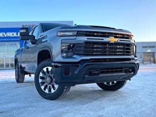 <br> <br> With stout build quality and astounding towing capability, there isnt a better choice than this Silverado 2500HD for all your work-site needs. <br> <br>This 2024 Silverado 2500HD is highly configurable work truck that can haul a colossal amount of weight thanks to its potent drivetrain. This truck also offers amazing interior features that nestle occupants in comfort and luxury, with a great selection of tech features. For heavy-duty activities and even long-haul trips, the Silverado 2500HD is all the truck youll ever need.<br> <br> This sterling grey metallic sought after diesel Crew Cab 4X4 pickup has an automatic transmission and is powered by a 470HP 6.6L 8 Cylinder Engine.<br> <br> Our Silverado 2500HDs trim level is Custom. Stepping up to this Silverado 2500HD Custom is a great choice as it comes with features like stylish aluminum wheels, a 7 inch touchscreen with Bluetooth streaming audio, Apple CarPlay and Android Auto, a heavy-duty locking rear differential, painted bumpers and remote keyless entry. Additional features also include cruise control and steering wheel audio controls, 4G LTE hotspot capability, a rear vision camera, teen driver technology, easy to clean rubberized floors, power windows and much more. This vehicle has been upgraded with the following features: Lane Departure Warning, Following Distance Indicator. <br><br> <br/><br>Contact our Sales Department today by: <br><br>Phone: 1 (306) 882-2691 <br><br>Text: 1-306-800-5376 <br><br>- Want to trade your vehicle? Make the drive and well have it professionally appraised, for FREE! <br><br>- Financing available! Onsite credit specialists on hand to serve you! <br><br>- Apply online for financing! <br><br>- Professional, courteous, and friendly staff are ready to help you get into your dream ride! <br><br>- Call today to book your test drive! <br><br>- HUGE selection of new GMC, Buick and Chevy Vehicles! <br><br>- Fully equipped service shop with GM certified technicians <br><br>- Full Service Quick Lube Bay! Drive up. Drive in. Drive out! <br><br>- Best Oil Change in Saskatchewan! <br><br>- Oil changes for all makes and models including GMC, Buick, Chevrolet, Ford, Dodge, Ram, Kia, Toyota, Hyundai, Honda, Chrysler, Jeep, Audi, BMW, and more! <br><br>- Rosetowns ONLY Quick Lube Oil Change! <br><br>- 24/7 Touchless car wash <br><br>- Fully stocked parts department featuring a large line of in-stock winter tires! <br> <br><br><br>Rosetown Mainline Motor Products, also known as Mainline Motors is the ORIGINAL King Of Trucks, featuring Chevy Silverado, GMC Sierra, Buick Enclave, Chevy Traverse, Chevy Equinox, Chevy Cruze, GMC Acadia, GMC Terrain, and pre-owned Chevy, GMC, Buick, Ford, Dodge, Ram, and more, proudly serving Saskatchewan. As part of the Mainline Automotive Group of Dealerships in Western Canada, we are also committed to servicing customers anywhere in Western Canada! We have a huge selection of cars, trucks, and crossover SUVs, so if youre looking for your next new GMC, Buick, Chevrolet or any brand on a used vehicle, dont hesitate to contact us online, give us a call at 1 (306) 882-2691 or swing by our dealership at 506 Hyw 7 W in Rosetown, Saskatchewan. We look forward to getting you rolling in your next new or used vehicle! <br> <br><br><br>* Vehicles may not be exactly as shown. Contact dealer for specific model photos. Pricing and availability subject to change. All pricing is cash price including fees. Taxes to be paid by the purchaser. While great effort is made to ensure the accuracy of the information on this site, errors do occur so please verify information with a customer service rep. This is easily done by calling us at 1 (306) 882-2691 or by visiting us at the dealership. <br><br> Come by and check out our fleet of 70+ used cars and trucks and 130+ new cars and trucks for sale in Rosetown. o~o