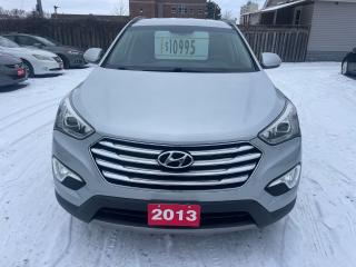 <div>2013 Hyundai Santa Fe XL silver with black interior is one owner clean carfax no accidents reported rare 7 passenger comes with power windows and locks leather interior heated seats navigation back up camera keyless entry alloys full set of winter tires on wheels assurant coast to coast 6 months 6000 km warranty looks and runs great </div>