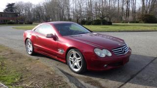 2003 Mercedes Benz SL500 convertible, 2 door, cruise control, air conditioning, AM/FM radio, CD player, heated seats, cooled seats, convertible hardtop, powered seats, memory seats,   power door locks, power mirrors, power sunroof, red exterior, black interior, leather. Certification and decal valid until May 2024. $15,810.00 plus $375 processing fee, $16,185.00 total payment obligation before taxes.  Listing report, warranty, contract commitment cancellation fee, financing available on approved credit (some limitations and exceptions may apply). All above specifications and information is considered to be accurate but is not guaranteed and no opinion or advice is given as to whether this item should be purchased. We do not allow test drives due to theft, fraud and acts of vandalism. Instead we provide the following benefits: Complimentary Warranty (with options to extend), Limited Money Back Satisfaction Guarantee on Fully Completed Contracts, Contract Commitment Cancellation, and an Open-Ended Sell-Back Option. Ask seller for details or call 604-522-REPO(7376) to confirm listing availability.