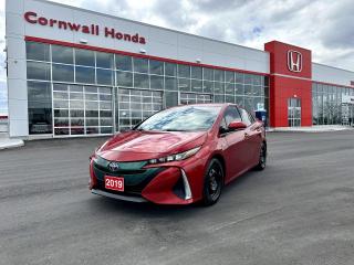 Red 2019 Toyota Prius Prime FWD Continuously Variable (ECVT) 1.8L 4-Cylinder DOHC 16V. An excellent option for those looking to save at the pumps! With gas prices rising, a plug-in hybrid makes an excellent choice. The Prius has always been the optimum choice for those looking for peak fuel efficiency. Every pre-owned vehicle Cornwall Honda gets must go through a rigorous 100-point safety inspection performed by our Honda-trained technicians. 



At Cornwall Honda, we wouldnt let you leave our lot in a dirty vehicle, thats why our experienced, on-hand detailers are ready to take care of each vehicle sold. This is to ensure that your pre-owned vehicle looks as best as it possibly can. From steam cleaning all materials and fabrics to polishing any type of surface, we do it all!



Visit us at our dealership located at 2660 Brookdale Ave., Cornwall, ON.



Welcome to Cornwall Honda where we have been proudly serving the Cornwall and surrounding area since the early 1970s. Our team is committed to making this your best car-buying experience. One-stop shopping is a reality at Cornwall Honda. We have the vehicle that meets your needs. Located in beautiful Cornwall, just south of highway 401.



Cornwall Honda offers preferred bank rates and finance options for all walks-of-life in a professional, informative, and comfortable atmosphere. Our Finance team will work for you to get you approved for the vehicle you want.



CALL TODAY TO BOOK YOUR TEST DRIVE!!!!!



ABS brakes, Active Cruise Control, Alloy wheels, Electronic Stability Control, Heated door mirrors, Heated Front Seats, Illuminated entry, Low tire pressure warning, Remote keyless entry, Traction control.





 Full Vehicle History Report includes CarFax Report and any available Maintenance/Repair Records.