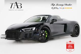 This Beautiful 2017 Audi R8 5.2 V10 Spyder is a local Ontario vehicle that is known for its stunning design, powerful engine, and advanced technology features. It is powered by a potent 5.2-liter V10 engine, delivering exhilarating performance with its impressive output of horsepower and torque.

Key Features Includes:

- V10
- Spyder
- Carbon Fiber
- Quattro
- Navigation
- Bluetooth
- Backup Camera
- Bang and Olufsen Sound System
- Heated Steering Wheel
- Audi Smartphone Interface
- Cruise Control
- Traction Control System
- Electronic Stability Control
- Green Brake Calipers
- 20" Alloy Wheels 

NOW OFFERING 3 MONTH DEFERRED FINANCING PAYMENTS ON APPROVED CREDIT. 

Looking for a top-rated pre-owned luxury car dealership in the GTA? Look no further than Toronto Auto Brokers (TAB)! Were proud to have won multiple awards, including the 2023 GTA Top Choice Luxury Pre Owned Dealership Award, 2023 CarGurus Top Rated Dealer, 2024 CBRB Dealer Award, the Canadian Choice Award 2024,the 2024 BNS Award, the 2023 Three Best Rated Dealer Award, and many more!

With 30 years of experience serving the Greater Toronto Area, TAB is a respected and trusted name in the pre-owned luxury car industry. Our 30,000 sq.Ft indoor showroom is home to a wide range of luxury vehicles from top brands like BMW, Mercedes-Benz, Audi, Porsche, Land Rover, Jaguar, Aston Martin, Bentley, Maserati, and more. And we dont just serve the GTA, were proud to offer our services to all cities in Canada, including Vancouver, Montreal, Calgary, Edmonton, Winnipeg, Saskatchewan, Halifax, and more.

At TAB, were committed to providing a no-pressure environment and honest work ethics. As a family-owned and operated business, we treat every customer like family and ensure that every interaction is a positive one. Come experience the TAB Lifestyle at its truest form, luxury car buying has never been more enjoyable and exciting!

We offer a variety of services to make your purchase experience as easy and stress-free as possible. From competitive and simple financing and leasing options to extended warranties, aftermarket services, and full history reports on every vehicle, we have everything you need to make an informed decision. We welcome every trade, even if youre just looking to sell your car without buying, and when it comes to financing or leasing, we offer same day approvals, with access to over 50 lenders, including all of the banks in Canada. Feel free to check out your own Equifax credit score without affecting your credit score, simply click on the Equifax tab above and see if you qualify.

So if youre looking for a luxury pre-owned car dealership in Toronto, look no further than TAB! We proudly serve the GTA, including Toronto, Etobicoke, Woodbridge, North York, York Region, Vaughan, Thornhill, Richmond Hill, Mississauga, Scarborough, Markham, Oshawa, Peteborough, Hamilton, Newmarket, Orangeville, Aurora, Brantford, Barrie, Kitchener, Niagara Falls, Oakville, Cambridge, Kitchener, Waterloo, Guelph, London, Windsor, Orillia, Pickering, Ajax, Whitby, Durham, Cobourg, Belleville, Kingston, Ottawa, Montreal, Vancouver, Winnipeg, Calgary, Edmonton, Regina, Halifax, and more.

Call us today or visit our website to learn more about our inventory and services. And remember, all prices exclude applicable taxes and licensing, and vehicles can be certified at an additional cost of $799.