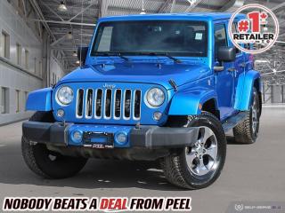 2016 Jeep Wrangler Unlimited Sahara | 3.6L Pentastar V6 | Hydro Blue Pearl | Heated Leather Seats | Body Colour Hard Top | Alpine Premium Audio System | Remote Start | 6.5" Touchscreen w/ NAV | Bluetooth 

One Owner

Introducing the rugged and versatile 2016 Jeep Wrangler Unlimited Sahara  a true icon in off-road capability and style. This particular model is loaded with premium features that elevate your driving experience to new heights. Sink into the comfort of heated leather seats as you embark on your next adventure, while the 6.5" touchscreen with navigation guides you effortlessly to your destination. Immerse yourself in crystal-clear sound with the Alpine premium audio system, and enjoy the convenience of remote start, allowing you to warm up your Wrangler before you even step outside. The connectivity group ensures seamless integration with your mobile devices, keeping you connected wherever you go. Plus, the body-color hardtop adds a touch of sophistication to the rugged exterior, perfectly complementing the striking Hydro Blue Pearl paint. Whether youre tackling rugged trails or cruising the city streets, the 2016 Jeep Wrangler Unlimited Sahara is ready for anything. Visit our dealership today and experience the thrill of driving a Jeep firsthand.
______________________________________________________

We have a fantastic selection of freshly traded vehicles ready for anyone looking to SAVE BIG $$$!!! Over 7 acres and 1000 New & Used vehicles in inventory!

WE TAKE ALL TRADES & CREDIT. WE SHIP ANYWHERE IN CANADA! OUR TEAM IS READY TO SERVE YOU 7 DAYS! COME SEE WHY NOBODY BEATS A DEAL FROM PEEL! Your Source for ALL make and models used cars and trucks
______________________________________________________

*FREE CarFax (click the link above to check it out at no cost to you!)*

*FULLY CERTIFIED! (Have you seen some of these other dealers stating in their advertisements that certification is an additional fee? NOT HERE! Our certification is already included in our low sale prices to save you more!)

______________________________________________________

Have you followed us on YouTube, Instagram and TikTok yet? We have Monthly giveaways to Subscribers!

Serving, Toronto, Mississauga, Oakville, Hamilton, Niagara, Kingston, Oshawa, Ajax, Markham, Brampton, Barrie, Vaughan, Parry Sound, Sudbury, Sault Ste. Marie and Northern Ontario! We have nearly 1000 new and used vehicles available to choose from.

Peel Chrysler in Mississauga, Ontario serves and delivers to buyers from all corners of Ontario and Canada including Toronto, Oakville, North York, Richmond Hill, Ajax, Hamilton, Niagara Falls, Brampton, Thornhill, Scarborough, Vaughan, London, Windsor, Cambridge, Kitchener, Waterloo, Brantford, Sarnia, Pickering, Huntsville, Milton, Woodbridge, Maple, Aurora, Newmarket, Orangeville, Georgetown, Stouffville, Markham, North Bay, Sudbury, Barrie, Sault Ste. Marie, Parry Sound, Bracebridge, Gravenhurst, Oshawa, Ajax, Kingston, Innisfil and surrounding areas. On our website www.peelchrysler.com, you will find a vast selection of new vehicles including the new and used Ram 1500, 2500 and 3500. Chrysler Grand Caravan, Chrysler Pacifica, Jeep Cherokee, Wrangler and more. All vehicles are priced to sell. We deliver throughout Canada. website or call us 1-866-652-6197. 

All advertised prices are for cash sale only. Optional Finance and Lease terms are available. A Loan Processing Fee of $499 may apply to facilitate selected Finance or Lease options. If opting to trade an encumbered vehicle towards a purchase and require Peel Chrysler to facilitate a lien payout on your behalf, a Lien Payout Fee of $299 may apply. Contact us for details. Peel Chrysler Pre-Owned Vehicles come standard with only one key.
