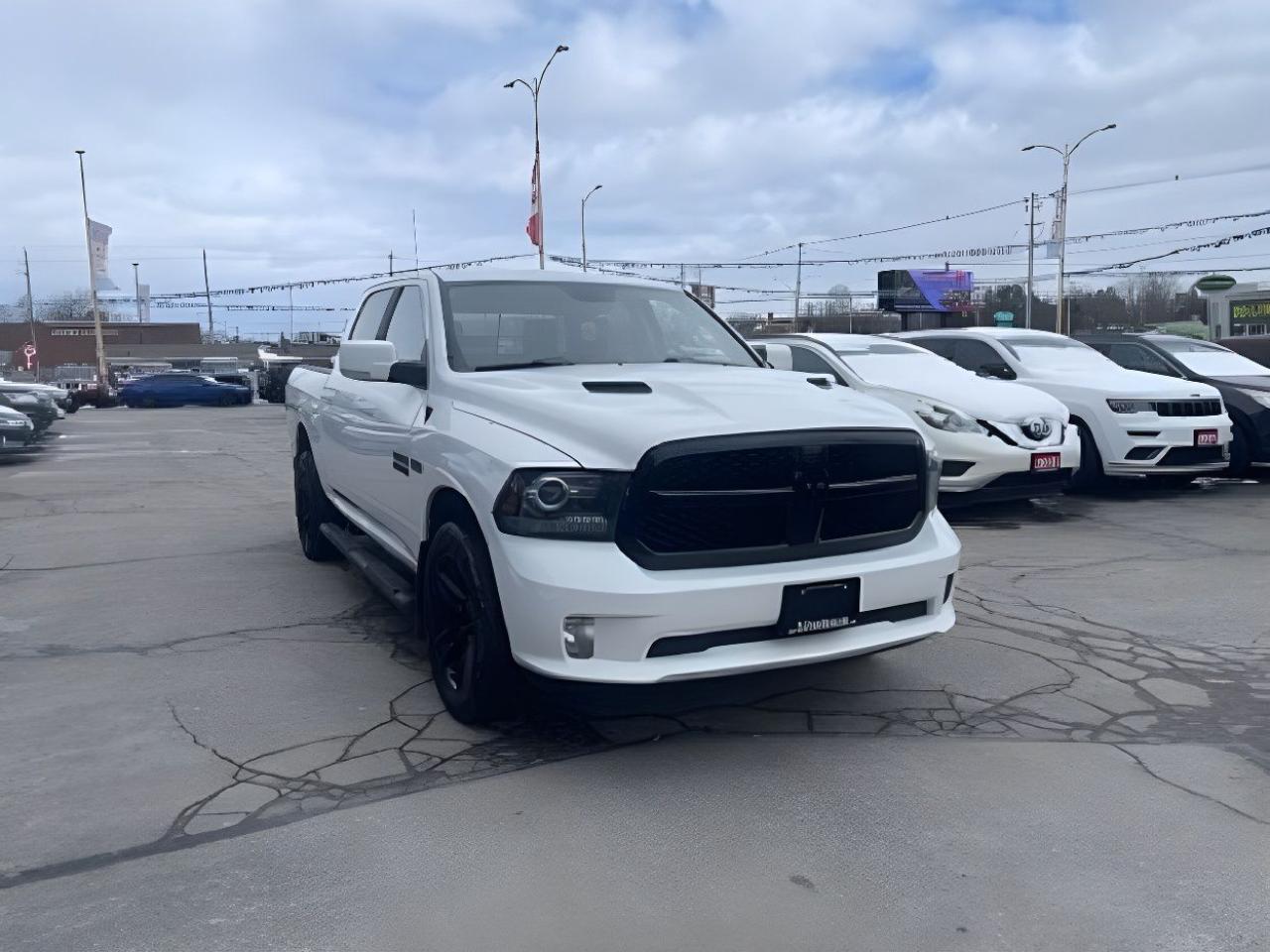 OVER $8000 IN FACTORY OPTIONS LOADED WITH OPTIONS SEE BELOW  Night 4x4 Crew Cab 57  Box -Ltd Avail- NAV LEATHER H-SEATS LOADED!  NIGHT EDITION Loaded EXCELLENT CONDITION MUST SEE WE FINANCE ALL CREDIT! 700+ VEHICLES IN STOCK
Instant Financing Approvals CALL OR TEXT 519+702+8888! Our Team will secure the Best Interest Rate from over 30 Auto Financing Lenders that can get you APPROVED! We also have access to in-house financing and leasing to help restore your credit.

 OPTIONAL EQUIPMENT
 $7500 IN EXTRA OPTIONS
 Leatherfaced front vented highback bucket seats        $1,695
 Power 10way driver and 6way passenger seats    
 Front ventilated seats                          
 Front heated seats                              
 Heated steering wheel                            
 Customer Preferred Package 26Q                             $495
 Black R_A_M tailgate badge                        
 Night Edition                                      
 20x9inch Black aluminum wheels                  
 Convenience Group                                          $495
 Keyless Enter n Go with pushbutton start    
 Automatic high beam headlamp control            
 Rainsensing windshield wipers                    
 Remote proximity keyless entry                      
 Remote Start & Security Alarm Group                        $595
 Remote start system                                
 Security alarm                                    
 Sport Premium Group                                        $695
 9 Alpine speakers with subwoofer        
 Humidity sensor                                  
 A/C with dualzone automatic temperature control    
 Sport performance hood                                     $995
 Black tubular side steps                                   $700
 Uconnect 4C NAV with 8.4inch display                      $770
 GPS navigation                                    
SiriusXM Traffic Plus                            
SiriusXM Travel Link                          
ParkView Rear BackUp Camera                               $475
Class IV hitch receiver                                    $495
Electronic Trailer Brake Controller                        $375
Sprayin bedliner                                          $550

Financing available for all credit types! Whether you have Great Credit, No Credit, Slow Credit, Bad Credit, Been Bankrupt, On Disability, Or on a Pension,  for your car loan Guaranteed! For Your No Hassle, Same Day Auto Financing Approvals CALL OR TEXT 519+702+8888.
$0 down options available with low monthly payments! At times a down payment may be required for financing. Apply with Confidence at https://www.5stardealer.ca/finance-application/ Looking to just sell your vehicle? WE BUY EVERYTHING EVEN IF YOU DONT BUY OURS: https://www.5stardealer.ca/instant-cash-offer/
The price of the vehicle includes a $480 administration charge. HST and Licensing costs are extra.
*Standard Equipment is the default equipment supplied for the Make and Model of this vehicle but may not represent the final vehicle with additional/altered or fewer equipment options.