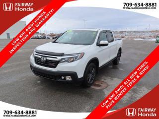 Awards:* JD Power Canada Automotive Performance, Execution and Layout (APEAL) StudyOdometer is 11419 kilometers below market average! Platinum White Pearl 2020 Honda Ridgeline Sport LOW KM! AWD! ALL NEW TIRES, PLUS WINTER TIRES & RI AWD 9-Speed Automatic 3.5L V6 SOHC i-VTEC 24V*Professionally Detailed*, *Market Value Pricing*, Black w/Cloth Seat Trim, 4-Wheel Disc Brakes, 7 Speakers, ABS brakes, Air Conditioning, AM/FM radio, Apple CarPlay/Android Auto, Automatic temperature control, Brake assist, Bumpers: body-colour, CD player, Delay-off headlights, Driver door bin, Driver vanity mirror, Drivers Seat Mounted Armrest, Dual front impact airbags, Dual front side impact airbags, Electronic Stability Control, Emergency communication system: HondaLink Assist, Exterior Parking Camera Rear, Fabric Seat Trim, Forward collision: Collision Mitigation Braking System (CMBS) + FCW mitigation, Four wheel independent suspension, Front anti-roll bar, Front dual zone A/C, Front fog lights, Front reading lights, Fully automatic headlights, Garage door transmitter: HomeLink, Heated door mirrors, Heated Front Bucket Seats, Illuminated entry, Lane departure: Lane Keeping Assist System (LKAS) active, Low tire pressure warning, Occupant sensing airbag, Outside temperature display, Overhead airbag, Overhead console, Panic alarm, Passenger door bin, Passenger seat mounted armrest, Passenger vanity mirror, Power door mirrors, Power driver seat, Power moonroof, Power steering, Power windows, Radio data system, Radio: 225-Watt AM/FM/CD Audio System, Rear air conditioning, Rear anti-roll bar, Rear reading lights, Rear step bumper, Rear window defroster, Remote keyless entry, Security system, Speed control, Speed-sensing steering, Split folding rear seat, Steering wheel mounted audio controls, Tachometer, Telescoping steering wheel, Tilt steering wheel, Traction control, Trip computer, Turn signal indicator mirrors.Honda Certified Details:* 24 hours/day, 7 days/week* 7 day/1,000 km exchange privilege whichever comes first* Exclusive finance rates on Certified Pre-Owned Honda models* 7 year / 160,000 km Power Train Warranty whichever comes first. This is an additional 2 year/60,000 kms beyond the original factory Power Train warranty. Honda Certified Used Vehicles also have the option to upgrade to a Honda Plus Extended Warranty* Vehicle history report. Access to MyHonda* Multipoint InspectionFairway Honda - Community Driven!