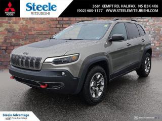 BIG TIME PRICE DROP OVER $2,000!!!2019 Jeep Cherokee Trailhawk HEATED SEATS | BACKUP CAM 4-Wheel Disc Brakes, 6 Speakers, ABS brakes, Air Conditioning, Alloy wheels, Apple CarPlay Capable, Apple CarPlay/Android Auto, Auxiliary Transmission Oil Cooler, Dual front side impact airbags, Front fog lights, Front Heated Seats, Hands-Free Comm w/Bluetooth, Hill Descent Control, Occupant sensing airbag, Off-Road Suspension, Overhead airbag, Power Liftgate, Premium Cabin Air Filter, Radio data system, Rear side impact airbag, Speed-sensing steering, Split folding rear seat, Trip computer.Odometer is 8794 kilometers below market average!Light Brownstone Pearlcoat 2019 Jeep Cherokee Trailhawk HEATED SEATS | BACKUP CAM 4WD 9-Speed Automatic Pentastar 3.2L V6 VVTSteele Mitsubishi has the largest and most diverse selection of preowned vehicles in HRM. Buy with confidence, knowing we use fair market pricing guaranteeing the absolute best value in all of our pre owned inventory!Steele Auto Group is one of the most diversified group of automobile dealerships in Canada, with 60 dealerships selling 29 brands and an employee base of well over 2300. Sales are up over last year and our plan going forward is to expand further into Atlantic Canada and the United States furthering our commitment to our Canadian customers as well as welcoming our new customers in the USA.Reviews:* Cherokee owners tend to be most impressed with the performance of the available V6 engine, a smooth-riding suspension, a powerful and straightforward touchscreen interface, and push-button access to numerous traction-enhancing tools for use in a variety of challenging driving conditions. A flexible and handy cabin, as well as a relatively quiet highway drive, help round out the package. Heres a machine thats built to explore new trails and terrain, while providing a comfortable and compliant ride on the road and highway. Source: autoTRADER.ca