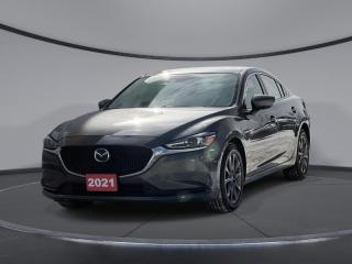 <b>Sunroof,  Heated Steering Wheel,  Heated Seats,  Adaptive Cruise Control,  Apple CarPlay!</b><br> <br>    Comfortable, luxurious and very stylish, the Mazda 6 has plenty of room for the whole family and easily keeps them entertained throughout the ride. This  2021 Mazda Mazda6 is for sale today in Sudbury. <br> <br>The 2021 Mazda6 was specially crafted to give drivers an exhilarating driving experience while making a bold statement. Thanks to its Skyactiv engine technology, on-road handling and feature rich interior, this amazing sedan provides an unforgettable ride. Filled with premium options, its cabin provides a comfortable and luxurious feel down to the smallest of details. This  sedan has 70,784 kms. Its  machine gray in colour  . It has an automatic transmission and is powered by a  2.5L I4 16V GDI DOHC engine.  This unit has some remaining factory warranty for added peace of mind. <br> <br> Our Mazda6s trim level is GS-L. This GS-L really takes it up a notch with a power moonroof, leatherette seats, a heated steering wheel, lane keep assist, lane departure warning and auto high beam assist. The list of premium features continues with heated seats, an advanced proximity keyless entry system, advanced cruise with stop and go, smart city brake support, advanced blind spot monitoring, an 8 inch color touchscreen with MAZDA CONNECT, Apple CarPlay and Android Auto. Additional impressive features include stylish aluminum wheels, heated power side mirrors, LED signature lighting plus it even comes with automatic dual zone climate control to keep all passengers comfortable on every trip. This vehicle has been upgraded with the following features: Sunroof,  Heated Steering Wheel,  Heated Seats,  Adaptive Cruise Control,  Apple Carplay,  Android Auto,  Lane Keep Assist. <br> <br>To apply right now for financing use this link : <a href=https://www.palladinohonda.com/finance/finance-application target=_blank>https://www.palladinohonda.com/finance/finance-application</a><br><br> <br/><br>Palladino Honda is your ultimate resource for all things Honda, especially for drivers in and around Sturgeon Falls, Elliot Lake, Espanola, Alban, and Little Current. Our dealership boasts a vast selection of high-class, top-quality Honda models, as well as expert financing advice and impeccable automotive service. These factors arent what set us apart from other dealerships, though. Rather, our uncompromising customer service and professionalism make every experience unforgettable, and keeps drivers coming back. The advertised price is for financing purchases only. All cash purchases will be subject to an additional surcharge of $2,501.00. This advertised price also does not include taxes and licensing fees.<br> Come by and check out our fleet of 110+ used cars and trucks and 60+ new cars and trucks for sale in Sudbury.  o~o