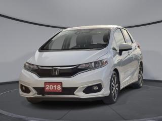 <b>Navigation,  Sunroof,  Leather Seats,  Bluetooth,  Blind Spot Detection!</b><br> <br>    An amazingly accommodating cabin, strong fuel economy, and competitive features estiblish the Honda Fit as a top choice in the subcompact car segment, says Edmunds. This  2018 Honda Fit is for sale today in Sudbury. <br> <br>You could say that the Fit is synonymous with fun. Its very fun to drive, full of awesome tech and safety features, and has room for four of your friends. The 2018 Fit has new sportier styling, while upholding its unmatched versatility and fun-to-drive attitude, add in Honda-tuned handling and this is a ride youll want to share with everyone.This  hatchback has 148,437 kms. Its  white orchid pearl in colour  . It has an automatic transmission and is powered by a  1.5L I4 16V GDI DOHC engine.  <br> <br> Our Fits trim level is EX-L Navi. The top of the line EX-L Navi is fully loaded with features you would expect in a luxury car including automatic climate control, navigation, heated leather seats, a leather-wrapped steering wheel, remote start, push button start, Bluetooth, SiriusXM, LaneWatch blind spot monitoring, a power moonroof, and much more. This vehicle has been upgraded with the following features: Navigation,  Sunroof,  Leather Seats,  Bluetooth,  Blind Spot Detection,  Fog Lights,  Proximity Key. <br> <br>To apply right now for financing use this link : <a href=https://www.palladinohonda.com/finance/finance-application target=_blank>https://www.palladinohonda.com/finance/finance-application</a><br><br> <br/><br>Palladino Honda is your ultimate resource for all things Honda, especially for drivers in and around Sturgeon Falls, Elliot Lake, Espanola, Alban, and Little Current. Our dealership boasts a vast selection of high-class, top-quality Honda models, as well as expert financing advice and impeccable automotive service. These factors arent what set us apart from other dealerships, though. Rather, our uncompromising customer service and professionalism make every experience unforgettable, and keeps drivers coming back. The advertised price is for financing purchases only. All cash purchases will be subject to an additional surcharge of $2,501.00. This advertised price also does not include taxes and licensing fees.<br> Come by and check out our fleet of 100+ used cars and trucks and 60+ new cars and trucks for sale in Sudbury.  o~o
