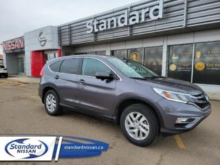 <b>Sunroof,  Bluetooth,  Rear View Camera,  Steering Wheel Audio Control,  Aluminum Wheels!</b><br> <br>  Compare at $23889 - Our Price is just $22578! <br> <br>   If youre shopping for a top shelf compact SUV, the CR-V remains one of your best bets, says Edmunds. This  2015 Honda CR-V is for sale today in Swift Current. <br> <br>In a world filled with to-do lists, the Honda CR-V is designed to adapt to your everyday needs. So whether youre hauling sports gear, picking up groceries, or taking your friends out for a spin, theres plenty of room, and then some. On top of its versatility, you get the fuel efficiency and reliability youd expect from a Honda. From the modern interior to the sleek exterior, life looks good with a CR-V. This  SUV has 168,994 kms. Its  modern steel metallic in colour  . It has an automatic transmission and is powered by a  185HP 2.4L 4 Cylinder Engine.  <br> <br> Our CR-Vs trim level is EX. This CR-V EX is a satisfying blend of features and value. It comes with a power moonroof, Bluetooth connectivity, a rearview camera, heated front seats, a power drivers seat, push button start, 2 USB ports, fog lights, aluminum wheels, LED daytime running lights, dual zone automatic climate control, automatic headlights, and more. This vehicle has been upgraded with the following features: Sunroof,  Bluetooth,  Rear View Camera,  Steering Wheel Audio Control,  Aluminum Wheels. <br> <br>To apply right now for financing use this link : <a href=https://www.standardnissan.ca/finance/apply-for-financing/ target=_blank>https://www.standardnissan.ca/finance/apply-for-financing/</a><br><br> <br/><br>Why buy from Standard Nissan in Swift Current, SK? Our dealership is owned & operated by a local family that has been serving the automotive needs of local clients for over 110 years! We rely on a reputation of fair deals with good service and top products. With your support, we are able to give back to the community. <br><br>Every retail vehicle new or used purchased from us receives our 5-star package:<br><ul><li>*Platinum Tire & Rim Road Hazzard Coverage</li><li>**Platinum Security Theft Prevention & Insurance</li><li>***Key Fob & Remote Replacement</li><li>****$20 Oil Change Discount For As Long As You Own Your Car</li><li>*****Nitrogen Filled Tires</li></ul><br>Buyers from all over have also discovered our customer service and deals as we deliver all over the prairies & beyond!#BetterTogether<br> Come by and check out our fleet of 30+ used cars and trucks and 40+ new cars and trucks for sale in Swift Current.  o~o