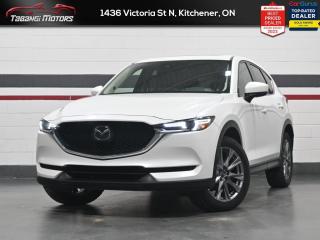 The 2021 Mazda CX-5s athletic handling, precise steering, and upscale cabin are just some of the reasons why it ranks near the top of the compact SUV class. This  2021 Mazda CX-5 is for sale today in Kitchener. <br><br> <iframe width=100% height=350 src=https://www.youtube.com/embed/EfiK2R2ckWE?si=a-T_uGbwrMRTkzOH title=YouTube video player frameborder=0 allow=accelerometer; autoplay; clipboard-write; encrypted-media; gyroscope; picture-in-picture; web-share allowfullscreen></iframe><br><br> <br>The 2021 CX-5 strengthens the connection between vehicle and driver. Mazda designers and engineers carefully consider every element of the vehicles makeup to ensure that the CX-5 outperforms expectations and elevates the experience of driving. Powerful and precise, yet comfortable and connected, the 2021 CX-5 is purposefully designed for drivers, no matter what the conditions might be. This  SUV has 85,099 kms. Its  white in colour  . It has a 6 speed automatic transmission and is powered by a  187HP 2.5L 4 Cylinder Engine.  This unit has some remaining factory warranty for added peace of mind. <br> <br> Our CX-5s trim level is GT. This CX-5 GT has just about everything you could imagine with a power moonroof, navigation, head-up display, air cooled leather seats, wood and metal trim, premium Bose sound, driver seat memory settings, proximity entry, SiriusXM, adaptive front lighting, HomeLink remote system, automatic climate control, and LED lighting with fog lights. This trim also adds traffic sign recognition to the driver assistance features like stop and go adaptive cruise, full range active braking assist, pedestrian detection, forward obstruction warning, lane keep assist with departure warning, and high beam control help make every drive more safe and less fatiguing. For even more comfort, you get heated seats, heated steering wheel, power liftgate, advanced blind spot monitoring, Mazda Connect enabled touchscreen, Apple CarPlay and Android Auto. This vehicle has been upgraded with the following features: Air, Rear Air, Tilt, Cruise, Power Windows, Power Locks, Power Mirrors.