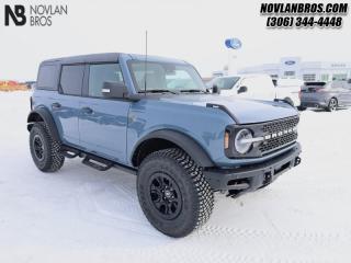<b>Leather Seats, 360-Degree Camera, Wireless Charging, Navigation, Heated Steering Wheel!</b><br> <br> <br> <br>Check out our great inventory of new vehicles at Novlan Brothers!<br> <br>  With cool retro-styling, innovative features and impressive off-road capability, this legendary 2024 Ford Bronco has very little to prove. <br> <br>With a nostalgia-inducing design along with remarkable on-road driving manners with supreme off-road capability, this 2024 Ford Bronco is indeed a jack of all trades and masters every one of them. Durable build materials and functional engineering coupled with modern day infotainment and driver assistive features ensure that this iconic vehicle takes on whatever you can throw at it. Want an SUV that can genuinely do it all and look good while at it? Look no further than this 2024 Ford Bronco!<br> <br> This azure grey met tri-coat SUV  has a 10 speed automatic transmission and is powered by a  315HP 2.7L V6 Cylinder Engine.<br> <br> Our Broncos trim level is Wildtrak. This Bronco Wildtrak is a great companion for your off-the-grid adventures, thanks to an amazing assortment of standard features such as front and rear locking differentials, skid plates for undercarriage protection, off-road suspension with FOX racing shock absorbers, aluminum wheels with beadlock capability, and front fog lamps. This rugged off-roader also treats you to amazing comfort and connectivity features that include heated front seats, remote engine start, dual-zone climate control, front and rear cupholders, and an upgraded infotainment system with Apple CarPlay, Android Auto, SiriusXM and inbuilt navigation, to get you back home from your off-road adventures. Road safety is assured thanks to a suite of systems including blind spot detection, pre-collision assist with pedestrian detection and cross-traffic alert, lane keeping assist with lane departure warning, rear parking sensors, and driver monitoring alert. Additional features include proximity keyless entry with push button start, trail control, trail turn assist, and so much more. This vehicle has been upgraded with the following features: Leather Seats, 360-degree Camera, Wireless Charging, Navigation, Heated Steering Wheel, 17 Inch Aluminum Wheels, Adaptive Cruise Control. <br><br> View the original window sticker for this vehicle with this url <b><a href=http://www.windowsticker.forddirect.com/windowsticker.pdf?vin=1FMEE2BP9RLA10112 target=_blank>http://www.windowsticker.forddirect.com/windowsticker.pdf?vin=1FMEE2BP9RLA10112</a></b>.<br> <br>To apply right now for financing use this link : <a href=http://novlanbros.com/credit/ target=_blank>http://novlanbros.com/credit/</a><br><br> <br/>    4.99% financing for 84 months. <br> Payments from <b>$1272.76</b> monthly with $0 down for 84 months @ 4.99% APR O.A.C. ( Plus applicable taxes -  Plus applicable fees   ).  Incentives expire 2024-04-30.  See dealer for details. <br> <br><br> Come by and check out our fleet of 30+ used cars and trucks and 50+ new cars and trucks for sale in Paradise Hill.  o~o