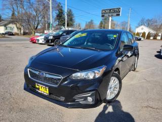 <p><span style=font-family: Segoe UI, sans-serif; font-size: 18px;>***ONE OWNER***VERY CLEAN BLACK ON BLACK ECO FRIENDLY SUBARU IMPREZA HATCHBACK WITH EXCELLENT MILEAGE, EQUIPPED W/ THE VERY FUEL EFFICIENT 4 CYLINDER 2.0L DOHC ENGINE, LOADED WITH ALL-WHEEL DRIVE, HEATED SEATS, APPLE/ANDROID CARPLAY, HEATED MIRRORS, AUTOMATIC HEADLIGHTS, BLUETOOTH CONNECTION, REAR-VIEW CAMERA, POWER LOCKS/WINDOWS AND MIRRORS, AIR CONDITIONING, AM/FM/XD/CD RADIO, CRUISE CONTROL, KEYLESS ENTRY, WARRANTY AND MORE! This vehicle comes certified with all-in pricing excluding HST tax and licensing. Also included is a complimentary 36 days complete coverage safety and powertrain warranty, and one year limited powertrain warranty. Please visit our website at www.bossauto.ca today!</span></p>
