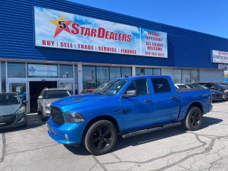 OVER $10,000 FACTORY EXTRA OPTIONS  MINT MUST SEE CREW CAB Express 4x4 Crew Cab 57  Bx WE FINANCE ALL CREDIT! 700+ VEHICLES IN STOCK
Instant Financing Approvals CALL OR TEXT 519+702+8888! Our Team will secure the Best Interest Rate from over 30 Auto Financing Lenders that can get you APPROVED! We also have access to in-house financing and leasing to help restore your credit.

$10,000 EXTRA OPTIONAL EQUIPMENT (May Replace Standard Equipment)

Hydro Blue Pearl $395
Premium cloth front bucket seats $475
Bucket seats
Customer Preferred Package 26J $1,000
Ram 1500 Express Group
Fog lamps
ParkSense Rear Park Assist System
Sub Zero Package $1,495
Front heated seats
Rear 60/40 splitfolding bench seat
115volt auxiliary power outlet
Power lumbar adjust
Power 10way driver seat including 2way lumbar
Security alarm
Heated steering wheel
Steering wheelmounted audio controls
Leatherwrapped steering wheel
Remote start system
Electronics Convenience Group $350
7inch colour incluster display
Night Edition $1,395
A/C with dualzone automatic temperature control
Black exterior badging
Gloss Black grille
Black 5.7L HEMI badge
Black R_A_M tailgate badge
Black 4x4 badge
Black dual exhaust tips
Google Android Auto
USB mobile projection
8.4inch touchscreen
Apple CarPlay capable
SiriusXM satellite radio with 1year subscription
SiriusXM Guardianincluded trial
Integrated centre stack radio
Uconnect 5W with 8.4inch display
20x8inch SemiGloss Black aluminum wheels
1year SiriusXM satellite radio subscription
1year subscription(registration required)
Wheel & Sound Group $1,095
Secondrow infloor storage bins
Carpet floor covering
Front floor mats
Rear floor mats
Remote keyless entry
8speed TorqueFlite automatic transmission $1,000
3.92 rear axle ratio $125
5.7L HEMI VVT V8 engine with FuelSaver MDS $995
Electronically controlled throttle
LED bed lighting $100
Mopar Sport performance hood $995
Black Mopar tubular side steps $700


Financing available for all credit types! Whether you have Great Credit, No Credit, Slow Credit, Bad Credit, Been Bankrupt, On Disability, Or on a Pension,  for your car loan Guaranteed! For Your No Hassle, Same Day Auto Financing Approvals CALL OR TEXT 519+702+8888.
$0 down options available with low monthly payments! At times a down payment may be required for financing. Apply with Confidence at https://www.5stardealer.ca/finance-application/ Looking to just sell your vehicle? WE BUY EVERYTHING EVEN IF YOU DONT BUY OURS: https://www.5stardealer.ca/instant-cash-offer/
The price of the vehicle includes a $480 administration charge. HST and Licensing costs are extra.
*Standard Equipment is the default equipment supplied for the Make and Model of this vehicle but may not represent the final vehicle with additional/altered or fewer equipment options.