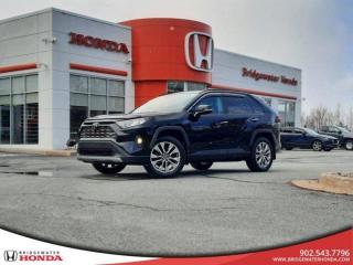 Odometer is 17655 kilometers below market average! Black 2019 Toyota RAV4 Limited AWD 8-Speed Automatic 2.5L 4-Cylinder SMPI Bridgewater Honda, Located in Bridgewater Nova Scotia.RAV4 Limited, 8-Speed Automatic, AWD, 4-Wheel Disc Brakes, ABS brakes, Air Conditioning, Apple CarPlay, Auto High-beam Headlights, Auto-dimming Rear-View mirror, Automatic temperature control, Brake assist, Bumpers: body-colour, Cruise Control, Delay-off headlights, Driver door bin, Driver vanity mirror, Dual front impact airbags, Dual front side impact airbags, Electronic Stability Control, Emergency communication system: Entune Safety Connect, Four wheel independent suspension, Front anti-roll bar, Front Bucket Seats, Front dual zone A/C, Front fog lights, Front reading lights, Fully automatic headlights, Garage door transmitter: HomeLink, Heated & Ventilated Front Bucket Seats, Heated door mirrors, Heated front seats, Heated rear seats, Illuminated entry, Knee airbag, Memory seat, Occupant sensing airbag, Overhead airbag, Panic alarm, Passenger door bin, Power door mirrors, Power driver seat, Power Liftgate, Power moonroof, Power steering, Power windows, Radio: Entune 3.0 Premium Audio w/Navigation, Rain sensing wipers, Rear anti-roll bar, Rear window defroster, Rear window wiper, Remote keyless entry, Security system, SofTex Leather Seat Trim, Speed-sensing steering, Split folding rear seat, Steering wheel mounted audio controls, Tachometer, Telescoping steering wheel, Traction control, Trip computer, Turn signal indicator mirrors, Variably intermittent wipers, Ventilated front seats, Wheels: 19 Aluminum Alloy w/Wheel Locks.