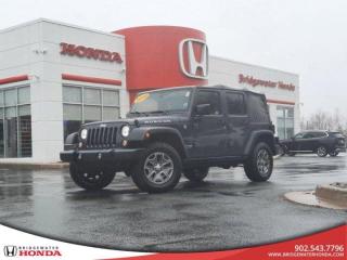 Recent Arrival! Rhino Clearcoat 2018 Jeep Wrangler JK Unlimited Rubicon 4WD 5-Speed Automatic Pentastar 3.6L V6 VVT Bridgewater Honda, Located in Bridgewater Nova Scotia.Air Conditioning w/Auto Temperature Control, Alloy wheels, AM/FM radio, CD player, Cruise Control, For SiriusXM Info, Call 888-539-7474, Front fog lights, GPS Navigation, LED Fog Lamps, Power steering, Power windows, Remote keyless entry, Remote Start System, SiriusXM Satellite Radio, Steering wheel mounted audio controls.Reviews:* Owners typically rave about the Wranglers toughness, capability, heavy-duty feel, and go-anywhere-anytime attitude. The unique looks and quirky drive are part of the Wranglers charm for many drivers, and the availability of plenty of high-grade feature content drew many shoppers in. Notably, the new-for-2012 V6 engine is a smooth and punchy performer with power to spare, and should turn in notably improved fuel efficiency for drivers upgrading from pre-Pentastar Wranglers. Source: autoTRADER.ca