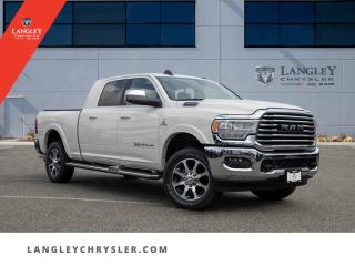 <p><strong><span style=font-family:Arial; font-size:18px;>Liberate yourself on an unforgettable road odyssey with the unparalleled 2022 RAM 3500 Limited Longhorn..</span></strong></p> <p><strong><span style=font-family:Arial; font-size:18px;>This majestic white steed, gently used and boasting a mere 24025 km, is more than just a pickup - its a testament to power, style, and the open road..</span></strong> <br> Embrace the freedom of the highway, cocooned in the luxury of black leather upholstery and a 12 screen.. Experience the joy of control with adjustable pedals, traction control, and an 8-speed automatic transmission.</p> <p><strong><span style=font-family:Arial; font-size:18px;>This is not just a vehicle, its a lifestyle statement - a declaration of your independence and your refusal to settle for less..</span></strong> <br> At Langley Chrysler, we know that buying a car should be more than just a transaction - it should be a love story.. With our RAM 3500, its love at first drive.</p> <p><strong><span style=font-family:Arial; font-size:18px;>The genuine wood console insert, dashboard, and door panels whisper of sophistication, while the ventilated front seats and dual-zone A/C offer a comfort thats nothing short of addictive..</span></strong> <br> Dont just love your car, love buying it.. Our sales team at Langley Chrysler is committed to making your purchasing experience as smooth as the RAMs 6.7L 6cyl engine.</p> <p><strong><span style=font-family:Arial; font-size:18px;>And with our plethora of features - from the auto-dimming rearview mirror to the bedliner - were not just selling a pickup, were offering you a ticket to a journey of a lifetime..</span></strong> <br> Feel the power of the RAM 3500s engine purring beneath you.. Experience the thrill of the navigation system guiding you to destinations unknown.</p> <p><strong><span style=font-family:Arial; font-size:18px;>Appreciate the security of ABS brakes and airbags, knowing your safety is our top priority..</span></strong> <br> The RAM 3500 is not just a pickup - its a testament to the spirit of adventure.. Its a pickup that picks you up, with the power to haul not just your cargo, but your expectations.</p> <p><strong><span style=font-family:Arial; font-size:18px;>So why settle for just a vehicle when you can have an odyssey?

At Langley Chrysler, we dont just sell cars - we sell dreams..</span></strong> <br> And with the 2022 RAM 3500 Limited Longhorn, were offering you a dream wrapped in white, ready to conquer the highway and take you where you need to be.. Liberate yourself.</p> <p><strong><span style=font-family:Arial; font-size:18px;>Embrace the road..</span></strong> <br> Fall in love with the journey - and the vehicle that takes you there.. The 2022 RAM 3500 Limited Longhorn is waiting.</p> <p><strong><span style=font-family:Arial; font-size:18px;>Are you ready for the ride of your life?.</span></strong></p>Documentation Fee $968, Finance Placement $628, Safety & Convenience Warranty $699

<p>*All prices plus applicable taxes, applicable environmental recovery charges, documentation of $599 and full tank of fuel surcharge of $76 if a full tank is chosen. <br />Other protection items available that are not included in the above price:<br />Tire & Rim Protection and Key fob insurance starting from $599<br />Service contracts (extended warranties) for coverage up to 7 years and 200,000 kms starting from $599<br />Custom vehicle accessory packages, mudflaps and deflectors, tire and rim packages, lift kits, exhaust kits and tonneau covers, canopies and much more that can be added to your payment at time of purchase<br />Undercoating, rust modules, and full protection packages starting from $199<br />Financing Fee of $500 when applicable<br />Flexible life, disability and critical illness insurances to protect portions of or the entire length of vehicle loan</p>