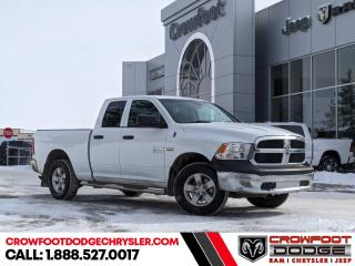 <b>Air Conditioning,  Power Windows,  Power Doors,  Cruise Control!</b><br> <br> Welcome to Crowfoot Dodge, Calgarys New and Pre-owned Superstore proudly serving Albertans for 44 years!<br> <br> Compare at $30495 - Our Price is just $28495! <br> <br>   Get the job done right with this rugged Ram 1500 pickup. This  2018 Ram 1500 is fresh on our lot in Calgary. <br> <br>The reasons why this Ram 1500 stands above the well-respected competition are evident: uncompromising capability, proven commitment to safety and security, and state-of-the-art technology. From its muscular exterior to the well-trimmed interior, this 2018 Ram 1500 is more than just a workhorse. Get the job done in comfort and style with this amazing full size truck. This  Quad Cab 4X4 pickup  has 125,552 kms. Stock number 10648 is white in colour  . It has an automatic transmission and is powered by a  395HP 5.7L 8 Cylinder Engine.   <br> <br> Our 1500s trim level is ST. This Ram ST is a serious work truck and an excellent value. It comes with a media hub with a USB port and an aux jack, air conditioning, cruise control, a front seat center armrest with three cupholders, power windows, power doors, six airbags, automatic headlights, electronic stability control, trailer sway control, heavy duty shocks, and more. This vehicle has been upgraded with the following features: Air Conditioning,  Power Windows,  Power Doors,  Cruise Control. <br> <br/><br> Buy this vehicle now for the lowest bi-weekly payment of <b>$204.64</b> with $0 down for 84 months @ 7.99% APR O.A.C. ( Plus GST      / Total Obligation of $37245  ).  See dealer for details. <br> <br>At Crowfoot Dodge, we offer:<br>
<ul>
<li>Over 500 New vehicles available and 100 Pre-Owned vehicles in stock...PLUS fresh trades arriving daily!</li>
<li>Financing and leasing arrangements with rates from prime +0%</li>
<li>Same day delivery.</li>
<li>Experienced sales staff with great customer service.</li>
</ul><br><br>
Come VISIT us today!<br><br> Come by and check out our fleet of 80+ used cars and trucks and 170+ new cars and trucks for sale in Calgary.  o~o