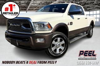 2018 Ram 3500 Laramie Longhorn | Crew Cab | 6.7L Cummins Diesel | 6-speed AISIN Heavy-duty Transmission | Heated & Ventilated Leather Seats | Heated Steering Wheel | Remote Start | Uconnect 4C NAV | Apple CarPlay & Android Auto | 9 Alpine Speakers w/ subwoofer | Second Row Heated Seats | Dual-zone Climate | Automatic High Beam | Rain-sensing Windshield Wipers | Class V Hitch Receiver | Trailer Brake Controller | Anti-spin Differential Rear Axle | Spray-in Bed Liner | Back Rack | Side Steps | 3.42 Rear Axle Ratio 

One Owner Clean Carfax

Presenting the 2018 Ram 3500 Laramie Longhorn, a robust and reliable workhorse designed to tackle the toughest tasks with ease. Powered by a formidable 6.7L Cummins Diesel engine paired with a 6-speed AISIN Heavy-duty Transmission, this truck delivers exceptional towing capability and impressive performance. Slip into the luxurious cabin featuring heated and ventilated leather seats, complemented by a heated steering wheel and remote start for added comfort and convenience. Stay connected on the go with the Uconnect 4C NAV system, which seamlessly integrates with Apple CarPlay & Android Auto for seamless smartphone connectivity. Enjoy premium sound quality with the 9 Alpine Speakers w/ subwoofer, while second-row heated seats ensure all passengers ride in comfort. Equipped with dual-zone climate control, automatic high beam headlights, and rain-sensing windshield wipers, this truck offers advanced technology to enhance every drive. With a Class V hitch receiver, trailer brake controller, and anti-spin differential rear axle, towing heavy loads is a breeze. The spray-in bed liner, back rack, side steps, and 3.42 rear axle ratio further elevate the functionality and versatility of the 2018 Ram 3500 Laramie Longhorn, making it the ultimate choice for those seeking a capable and well-equipped workhorse.
______________________________________________________

Engage & Explore with Peel Chrysler: Whether youre inquiring about our latest offers or seeking guidance, 1-866-652-6197 connects you directly. Dive deeper online or connect with our team to navigate your automotive journey seamlessly.

WE TAKE ALL TRADES & CREDIT. WE SHIP ANYWHERE IN CANADA! OUR TEAM IS READY TO SERVE YOU 7 DAYS! COME SEE WHY NOBODY BEATS A DEAL FROM PEEL! Your Source for ALL make and models used cars and trucks
______________________________________________________

*FREE CarFax (click the link above to check it out at no cost to you!)*

*FULLY CERTIFIED! (Have you seen some of these other dealers stating in their advertisements that certification is an additional fee? NOT HERE! Our certification is already included in our low sale prices to save you more!)

______________________________________________________

Peel Chrysler  A Trusted Destination: Based in Port Credit, Ontario, we proudly serve customers from all corners of Ontario and Canada including Toronto, Oakville, North York, Richmond Hill, Ajax, Hamilton, Niagara Falls, Brampton, Thornhill, Scarborough, Vaughan, London, Windsor, Cambridge, Kitchener, Waterloo, Brantford, Sarnia, Pickering, Huntsville, Milton, Woodbridge, Maple, Aurora, Newmarket, Orangeville, Georgetown, Stouffville, Markham, North Bay, Sudbury, Barrie, Sault Ste. Marie, Parry Sound, Bracebridge, Gravenhurst, Oshawa, Ajax, Kingston, Innisfil and surrounding areas. On our website www.peelchrysler.com, you will find a vast selection of new vehicles including the new and used Ram 1500, 2500 and 3500. Chrysler Grand Caravan, Chrysler Pacifica, Jeep Cherokee, Wrangler and more. All vehicles are priced to sell. We deliver throughout Canada. website or call us 1-866-652-6197. 

Your Journey, Our Commitment: Beyond the transaction, Peel Chrysler prioritizes your satisfaction. While many of our pre-owned vehicles come equipped with two keys, variations might occur based on trade-ins. Regardless, our commitment to quality and service remains steadfast. Experience unmatched convenience with our nationwide delivery options. All advertised prices are for cash sale only. Optional Finance and Lease terms are available. A Loan Processing Fee of $499 may apply to facilitate selected Finance or Lease options. If opting to trade an encumbered vehicle towards a purchase and require Peel Chrysler to facilitate a lien payout on your behalf, a Lien Payout Fee of $299 may apply. Contact us for details. Peel Chrysler Pre-Owned Vehicles come standard with only one key.