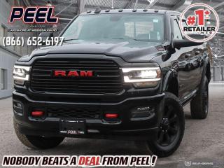 2022 Ram 2500 Laramie Crew Cab Night Edition | 6.4L Hemi V8 | 64" Bed | 12" Screen | 360 Surround View Camera | Power Running Boards | Harman/Kardon Premium Sound | Heated & Ventilated Leather Seats | Second Row Heated Seats | Night Edition | Tow-Mode Digital Rearview Mirror Package | 5th Wheel &  Gooseneck Towing Prep Group | Heavy-Duty Snowplow Prep Group | Towing Technology Group B | Trailer Brake Controller | 4.10 Rear Axle Ratio | Anti Spin Differential Rear Axle | Hard Tri-fold Tonneau Cover

One Owner Clean Carfax

Elevate your driving experience with the 2022 Ram 2500 Laramie Crew Cab Night Edition, a true embodiment of power, luxury, and versatility. This commanding truck boasts a potent 6.4L Hemi V8 engine paired with a 64" bed, providing the performance and capability you need for any task. Equipped with an expansive 12" touchscreen display and a 360 surround view camera, navigating through challenging terrain or tight spaces has never been easier. Step into the refined interior and indulge in the comfort of heated and ventilated leather seats, complemented by second-row heated seats for all passengers enjoyment. Immerse yourself in unparalleled sound quality with the Harman/Kardon premium sound system, delivering an immersive audio experience on every journey. Designed for maximum towing capability, this truck features a 5th Wheel & Gooseneck Towing Prep Group, Heavy-Duty Snowplow Prep Group, and Towing Technology Group B, ensuring you can tackle any hauling task with confidence. With thoughtful additions like power running boards, a tow-mode digital rearview mirror package, and a hard tri-fold tonneau cover, the Ram 2500 Laramie Night Edition offers both style and substance. Dominate the road in style and comfort with the exceptional 2022 Ram 2500 Laramie Crew Cab Night Edition.
______________________________________________________

Engage & Explore with Peel Chrysler: Whether youre inquiring about our latest offers or seeking guidance, 1-866-652-6197 connects you directly. Dive deeper online or connect with our team to navigate your automotive journey seamlessly.

WE TAKE ALL TRADES & CREDIT. WE SHIP ANYWHERE IN CANADA! OUR TEAM IS READY TO SERVE YOU 7 DAYS! COME SEE WHY NOBODY BEATS A DEAL FROM PEEL! Your Source for ALL make and models used cars and trucks
______________________________________________________

*FREE CarFax (click the link above to check it out at no cost to you!)*

*FULLY CERTIFIED! (Have you seen some of these other dealers stating in their advertisements that certification is an additional fee? NOT HERE! Our certification is already included in our low sale prices to save you more!)

______________________________________________________

Peel Chrysler  A Trusted Destination: Based in Port Credit, Ontario, we proudly serve customers from all corners of Ontario and Canada including Toronto, Oakville, North York, Richmond Hill, Ajax, Hamilton, Niagara Falls, Brampton, Thornhill, Scarborough, Vaughan, London, Windsor, Cambridge, Kitchener, Waterloo, Brantford, Sarnia, Pickering, Huntsville, Milton, Woodbridge, Maple, Aurora, Newmarket, Orangeville, Georgetown, Stouffville, Markham, North Bay, Sudbury, Barrie, Sault Ste. Marie, Parry Sound, Bracebridge, Gravenhurst, Oshawa, Ajax, Kingston, Innisfil and surrounding areas. On our website www.peelchrysler.com, you will find a vast selection of new vehicles including the new and used Ram 1500, 2500 and 3500. Chrysler Grand Caravan, Chrysler Pacifica, Jeep Cherokee, Wrangler and more. All vehicles are priced to sell. We deliver throughout Canada. website or call us 1-866-652-6197. 

Your Journey, Our Commitment: Beyond the transaction, Peel Chrysler prioritizes your satisfaction. While many of our pre-owned vehicles come equipped with two keys, variations might occur based on trade-ins. Regardless, our commitment to quality and service remains steadfast. Experience unmatched convenience with our nationwide delivery options. All advertised prices are for cash sale only. Optional Finance and Lease terms are available. A Loan Processing Fee of $499 may apply to facilitate selected Finance or Lease options. If opting to trade an encumbered vehicle towards a purchase and require Peel Chrysler to facilitate a lien payout on your behalf, a Lien Payout Fee of $299 may apply. Contact us for details. Peel Chrysler Pre-Owned Vehicles come standard with only one key.
