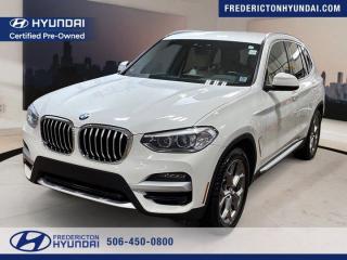 *LOOKING FOR PERFORMANCE AND LUXURY SUV? LOOK NO FURTHER JUST ARRIVED!!!*This Used 2020 BMW X3 xDrive30i is a sleek and stylish SUV that is ready to take on the roads of Fredericton with its powerful Intercooled Turbo Premium Unleaded I-4 2.0 L/122 gasoline engine. With an odometer reading of 77,461 kilometers, this vehicle has plenty of life left in it and is perfect for anyone looking for a reliable and luxurious ride. The AWD 8-Speed Automatic transmission ensures smooth handling and optimal performance in all driving conditions. Equipped with remote keyless entry, integrated navigation system with voice activation, blind spot detection, back-up camera, perimeter/approach lights, apple carplay preparation, real-time traffic display and Bluetooth wireless phone connectivity - this BMW X3 offers convenience and safety features that are essential for modern drivers. The dual zone front automatic air conditioning ensures comfort for all passengers while the proximity key allows for push button start only adds a touch of luxury to every drive. Dont miss out on the opportunity to own this exceptional vehicle from Fredericton Hyundai today!*BOOK YOUR TEST DRIVE TODAY AT WWW.FREDERICTONHYUNDAI.COM*