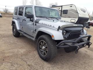 Used 2014 Jeep Wrangler Sahara unlimited HT 4x4 for sale in Edmonton, AB