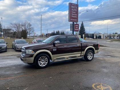 2015 RAM 1500 4WD CREW CAB 140.5" LONGHORN - Photo #1