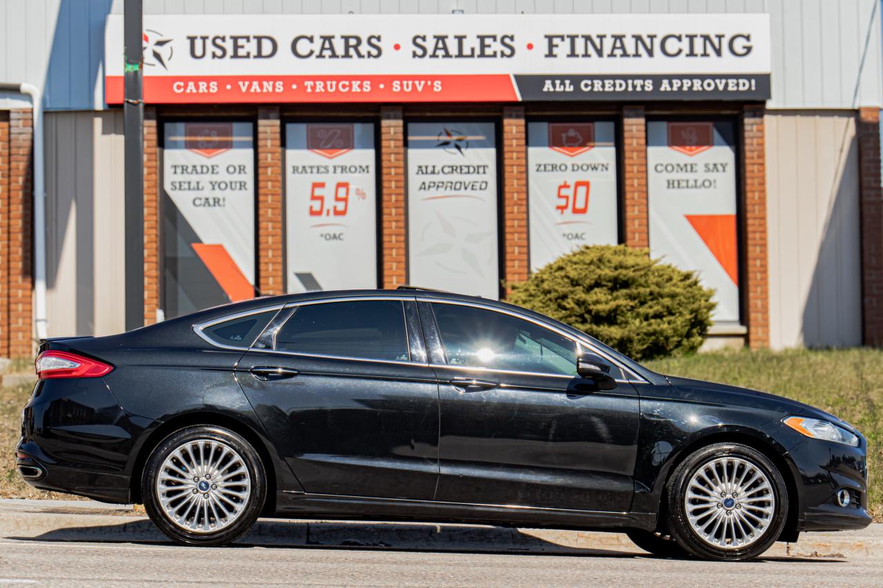 2015 Ford Fusion Titanium | AWD | Leather | Sunroof | Navi | Cam ++ Photo1